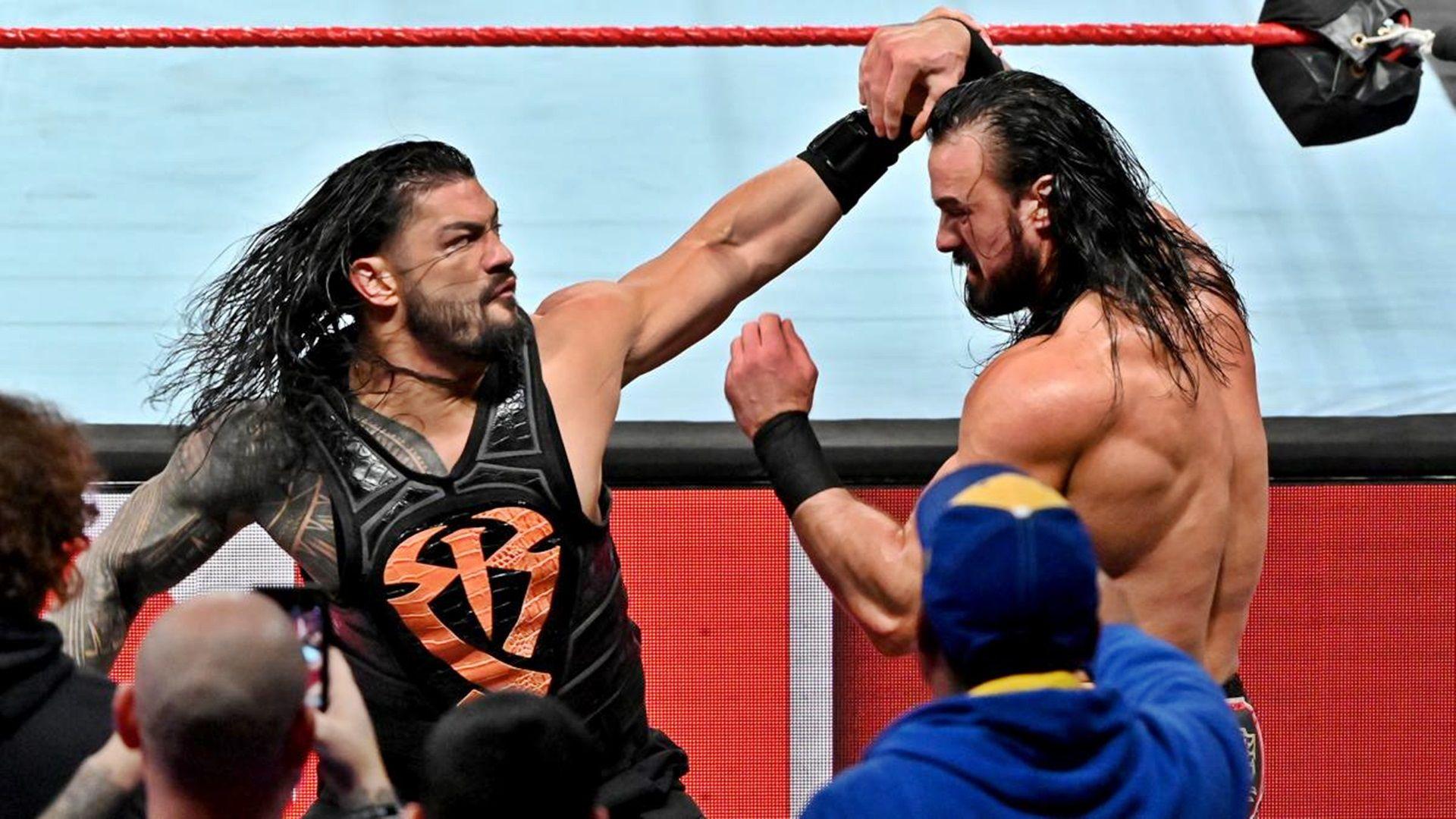 1920x1080 Roman Reigns Vs Drew Mcintyre At Wrestlemania Wallpaper