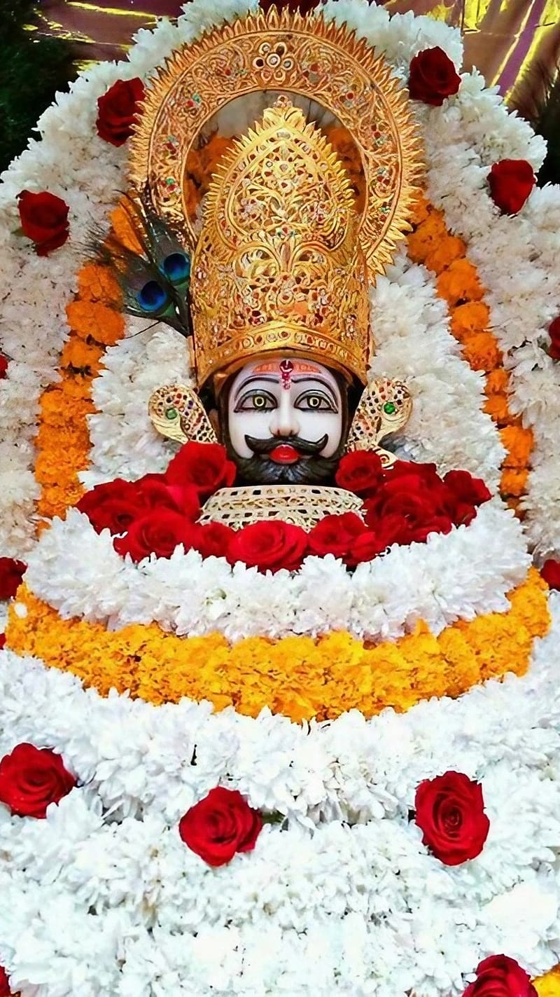 800x1423 Khatu Shyam, White Flowers, lord, god, HD phone wallpaper