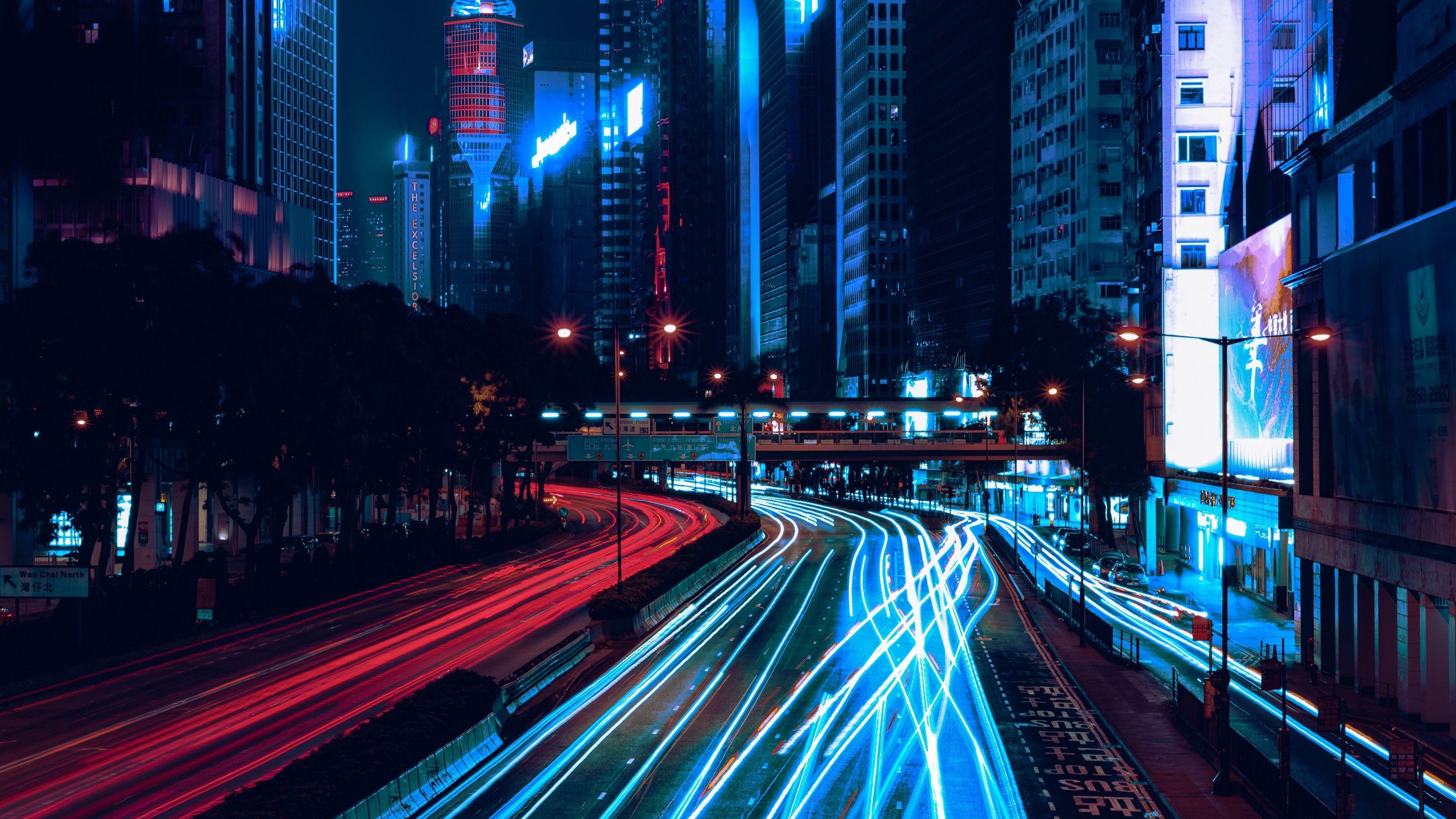 3840x2160 Download wallpaper 3840x2160 night city, skyscrapers, road, light
