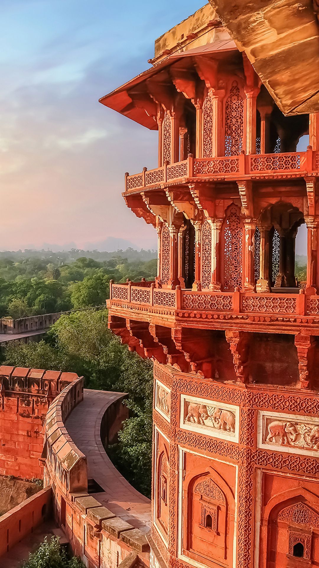 1080x1920 Agra Fort made of red sandstone and marble with view of cityscape at sunrise, India. Windows Spotlight Image