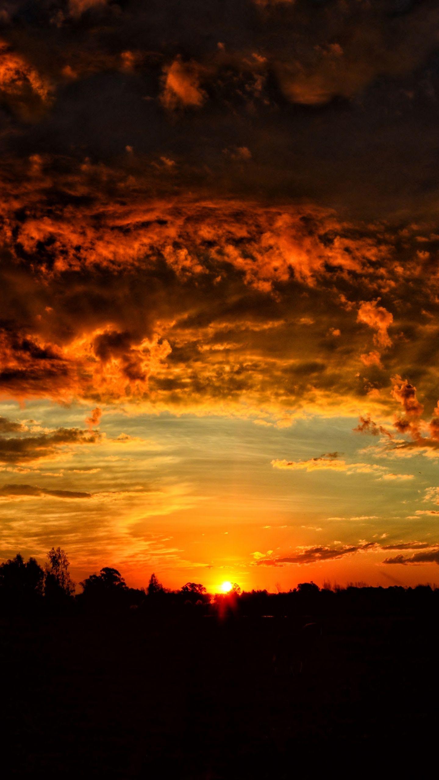 1440x2560 Download wallpaper 1440x2560 sunset, clouds, orange sky qhd