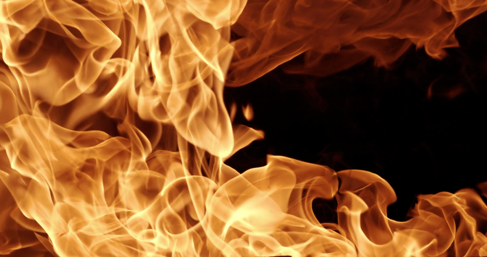 1920x1013 Flames of fire on black background in slow motion. Shot on super slow motion camera 1000 fps