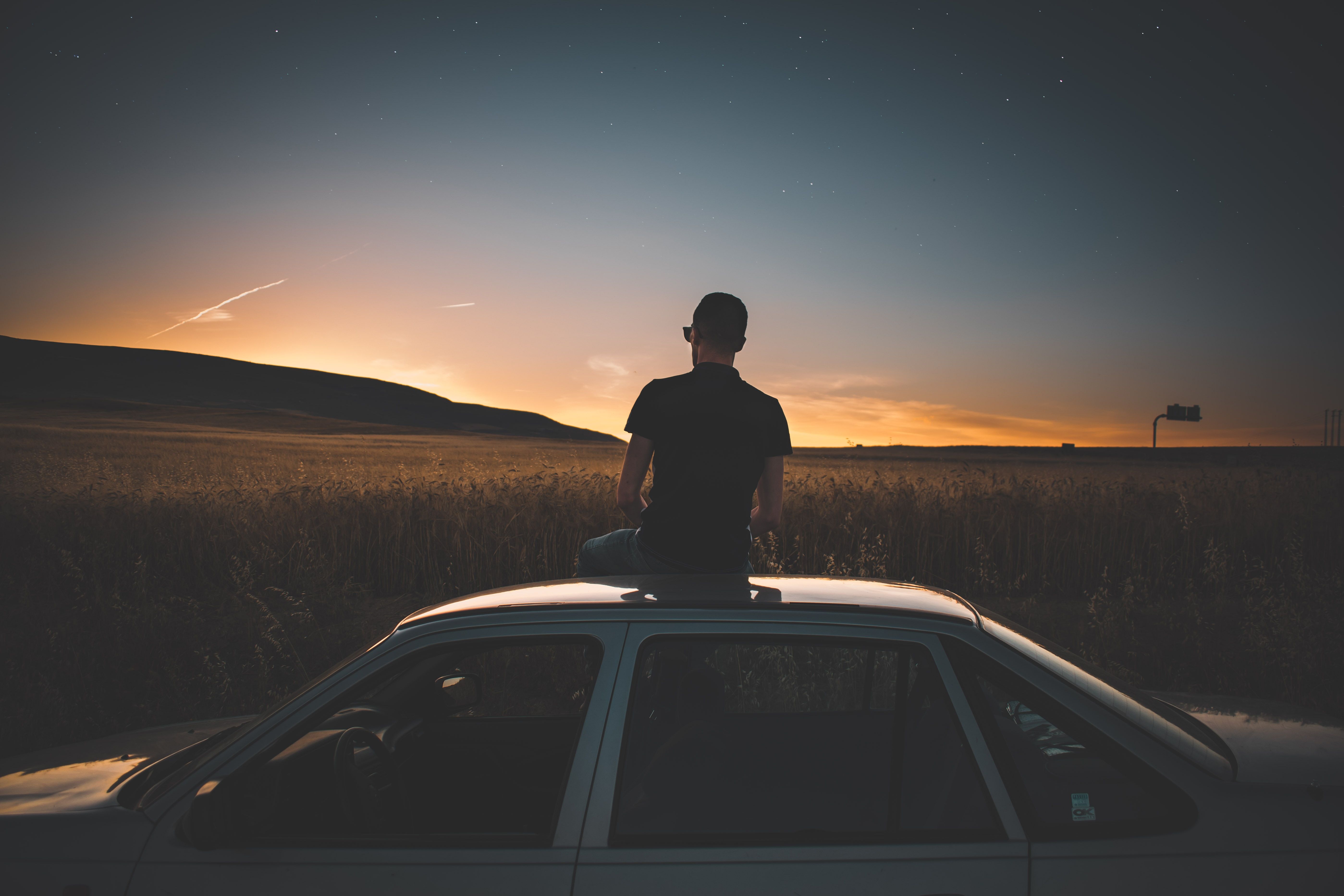 5595x3730 Boy Sitting On Top Of Car Watching Nature View 5k Wallpaper, HD Photography Wallpaper, 4k Wallpaper, Image, Background, Photos and Picture