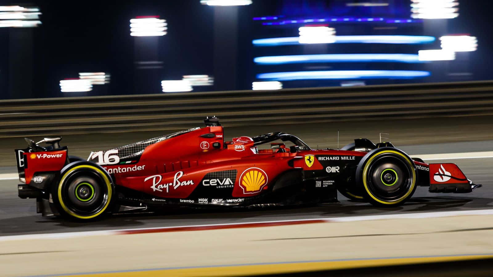 1600x900 Download Ferrari F1 Car Driving On A Track At Night Wallpaper