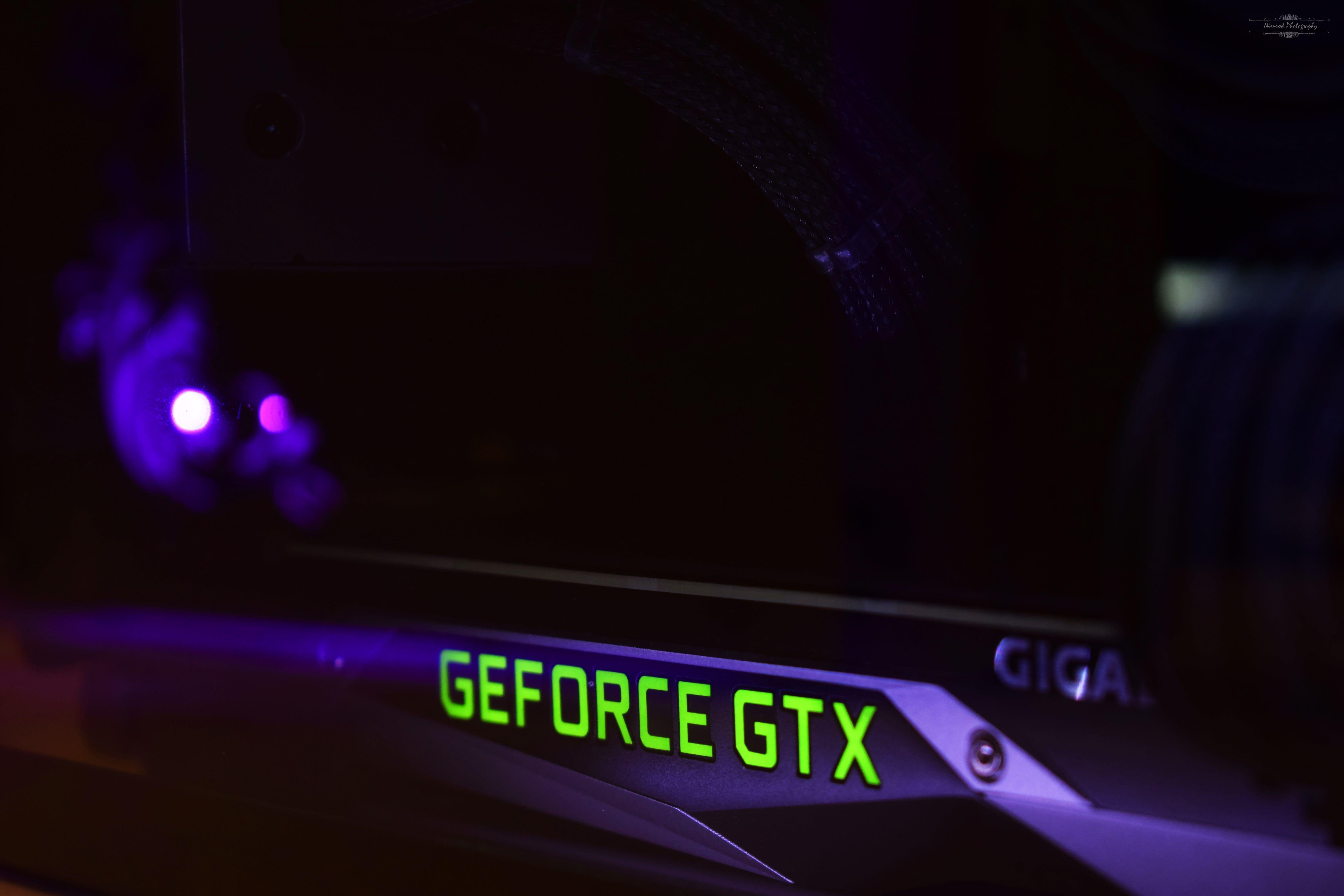 Gtx games. Логотип нвидиа фото. GEFORCE GTX С переливающейся подсветкой. NVIDIA вывеска. GEFORCE RTX посередине светится.