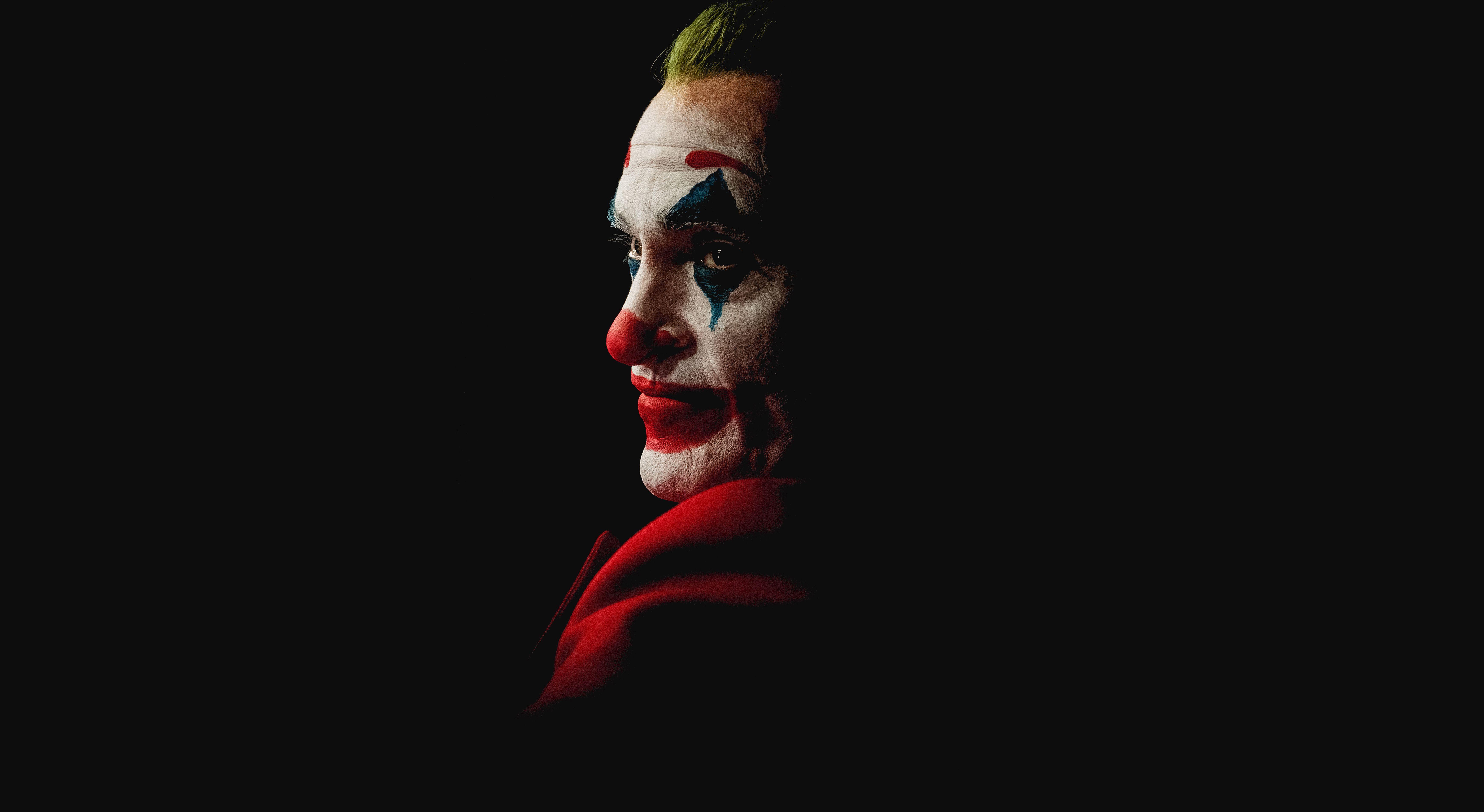 7000x3832 Wallpaper Joker, Joaquin Phoenix, Black background, 4K, 8K