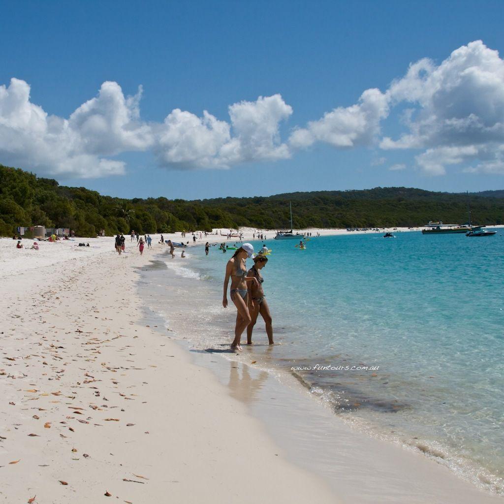 1024x1024 whitehaven Beach swimers ipad wallpaper. Taking a dip at Wh