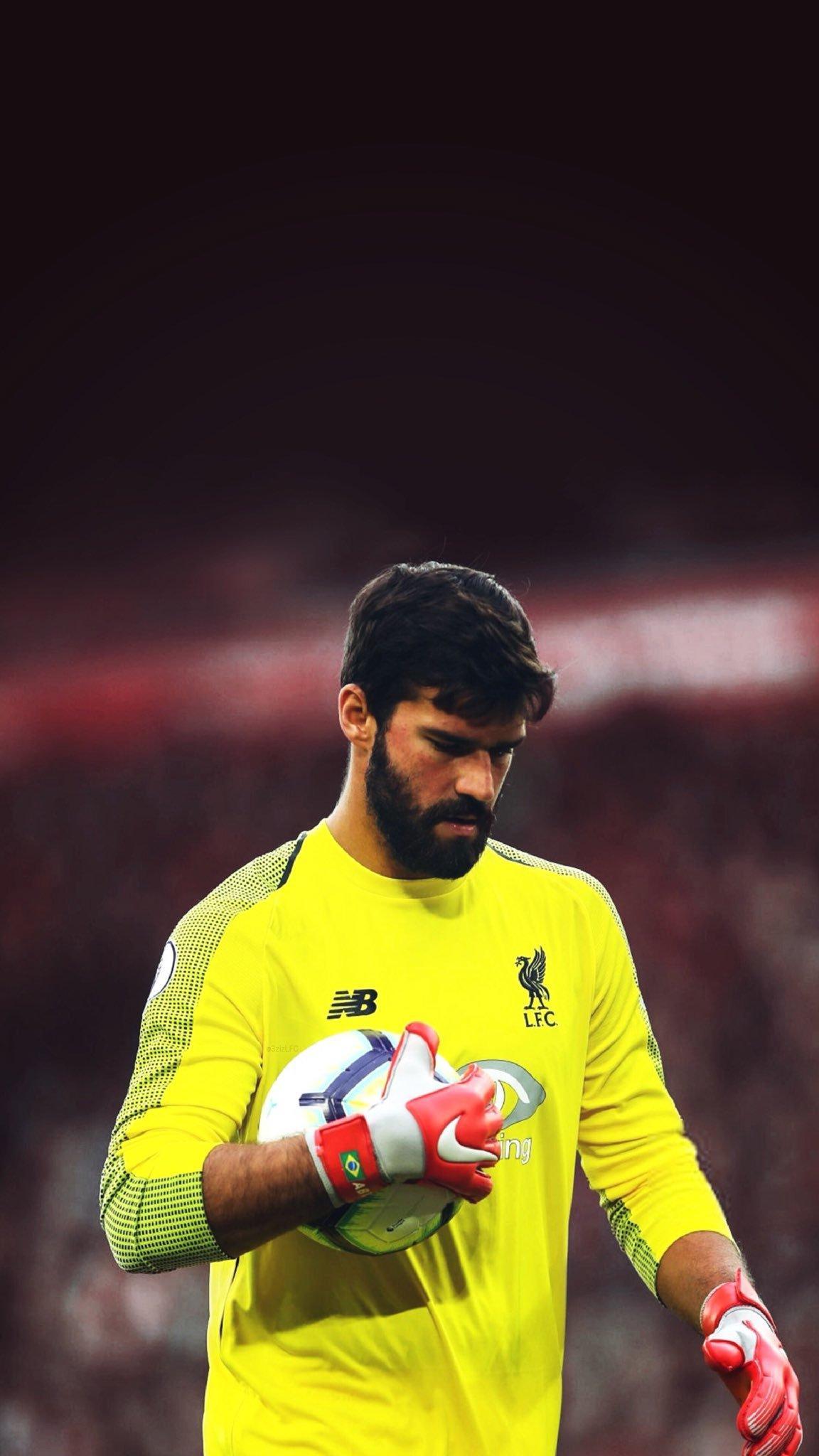 Download Alisson Becker Neon Green Liverpool Jersey Wallpaper