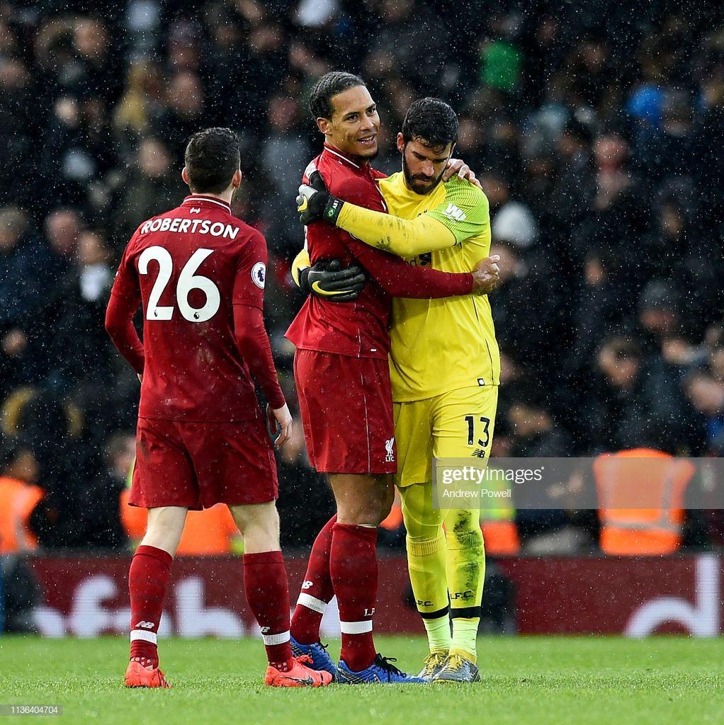 1022x1024 Virgil van Dijk and Alisson Becker of Liverpool embrace at the end
