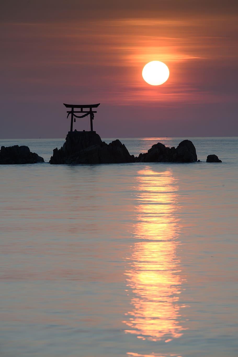 910x1365 HD wallpaper: Itsukushima Shrine in middle of body of water, rock