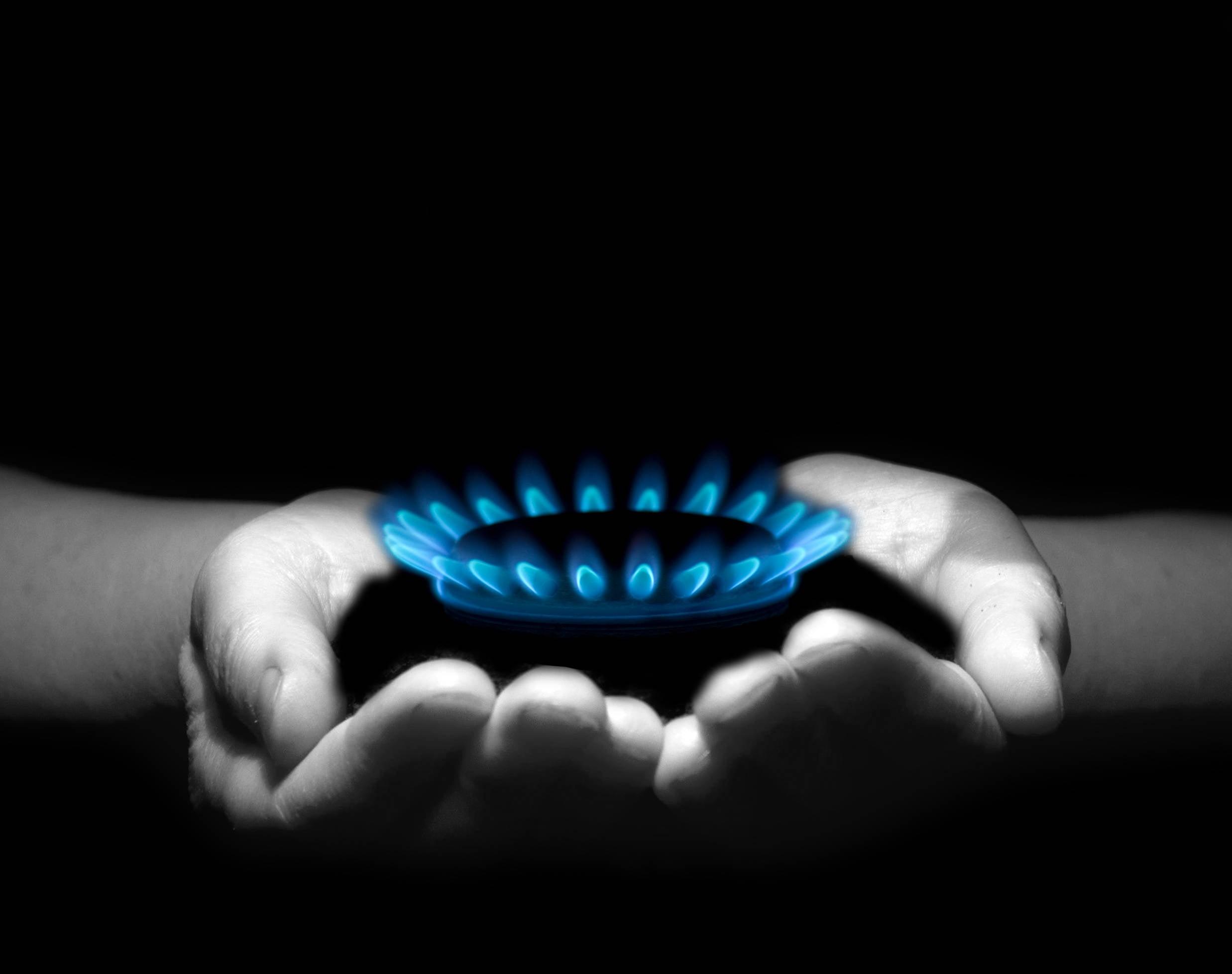 2475x1956 Person holding stove burner HD wallpaper