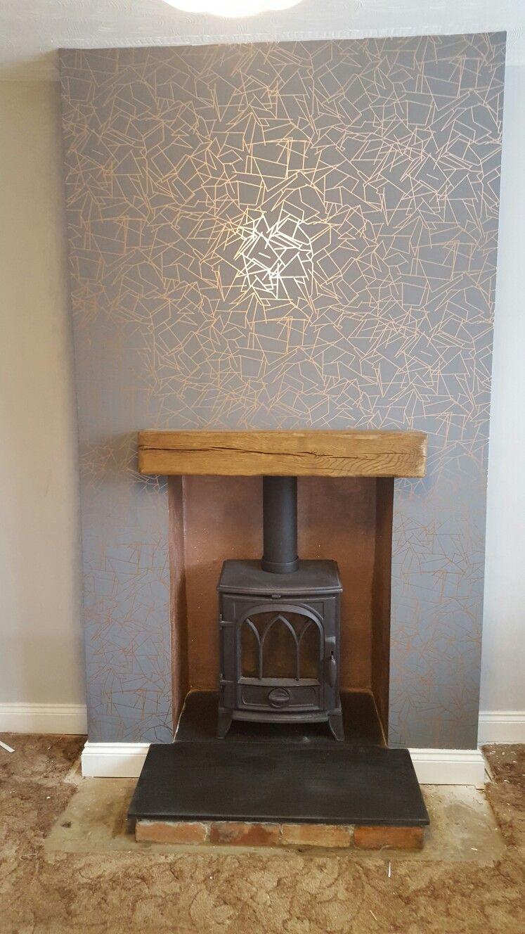 747x1328 Grey and copper chimney breast. Erika Wakerley Angles wallpaper