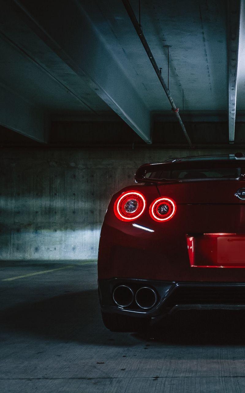 800x1280 Download wallpaper 800x1280 nissan gtr, nissan, headlights, rear