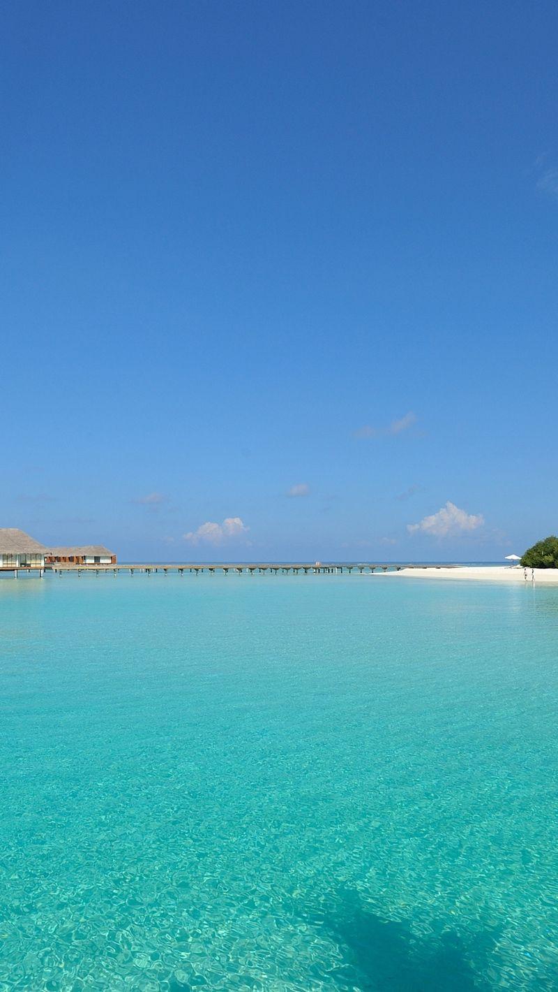 800x1420 Download wallpaper 800x1420 azure, tropics, hut, bungalow, sky