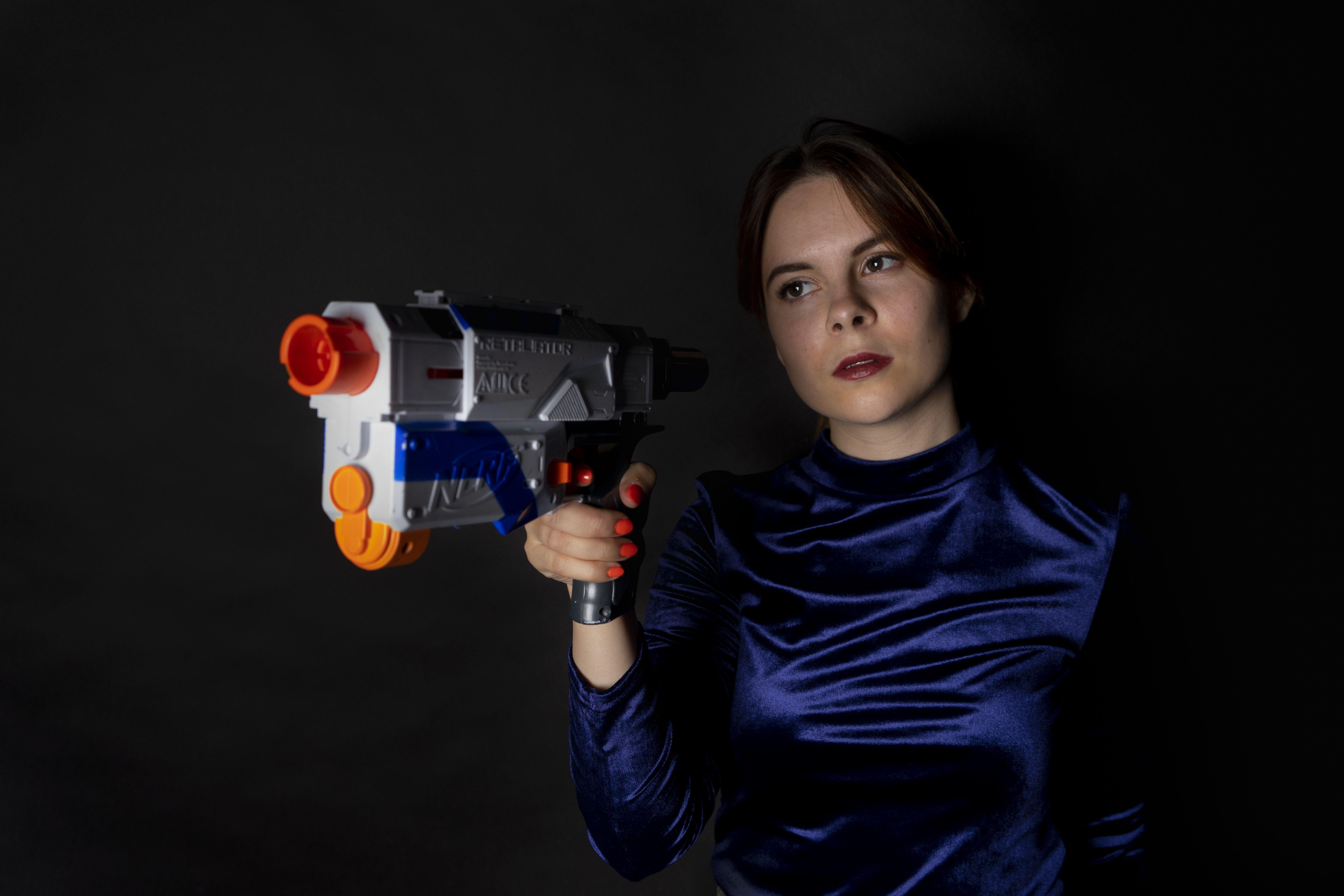 5784x3856 Woman Holding Blue and White Nerf Gun · Free