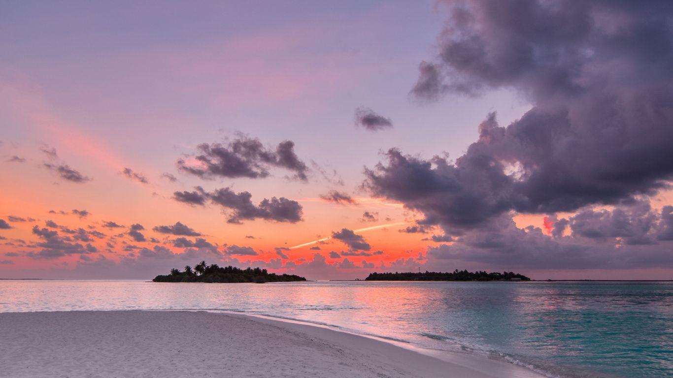 1366x768 Download 1366x768 wallpaper beach, island, sunset, clouds, nature