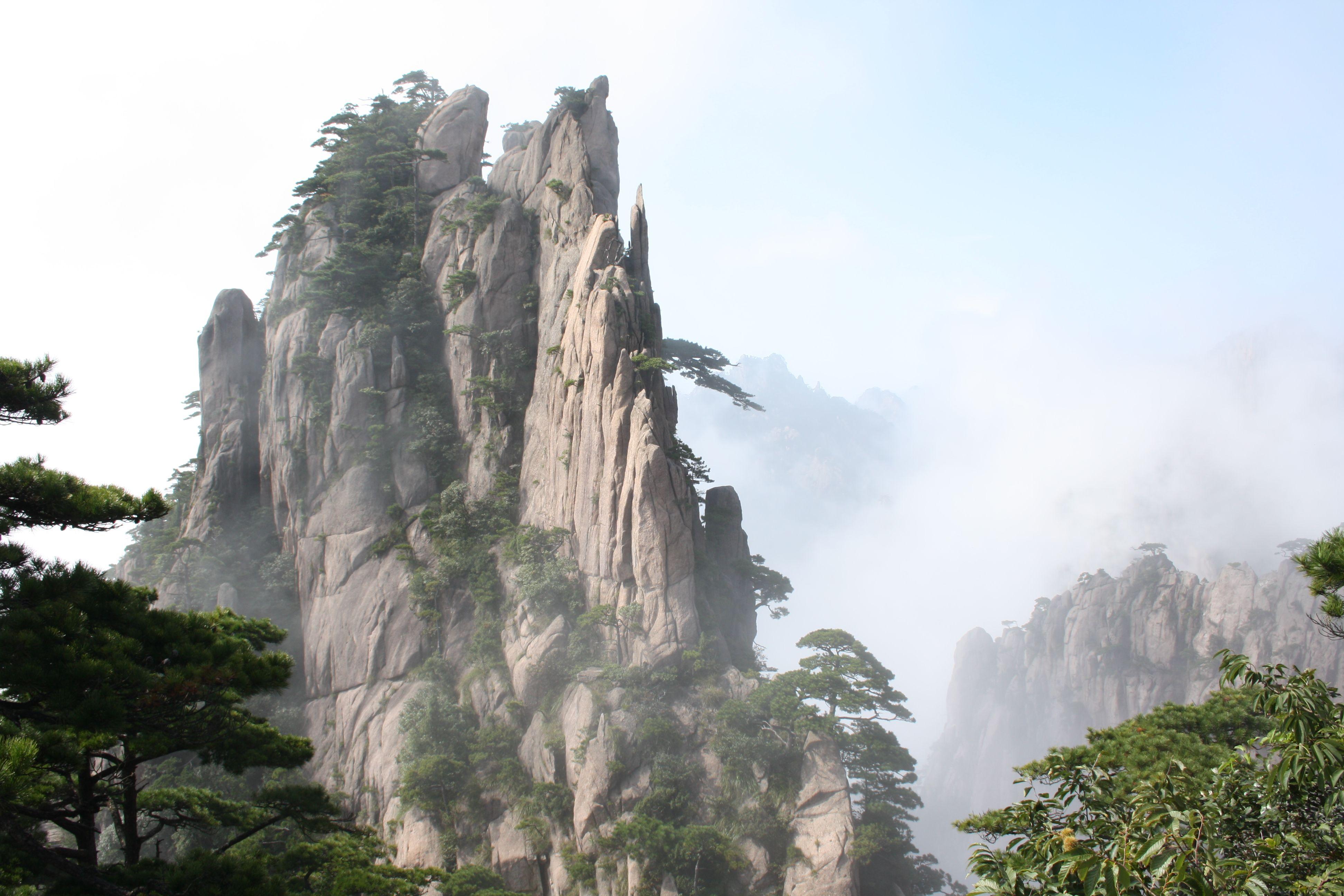 3888x2592 Huangshan with trees and clouds southern Anhui province in eastern