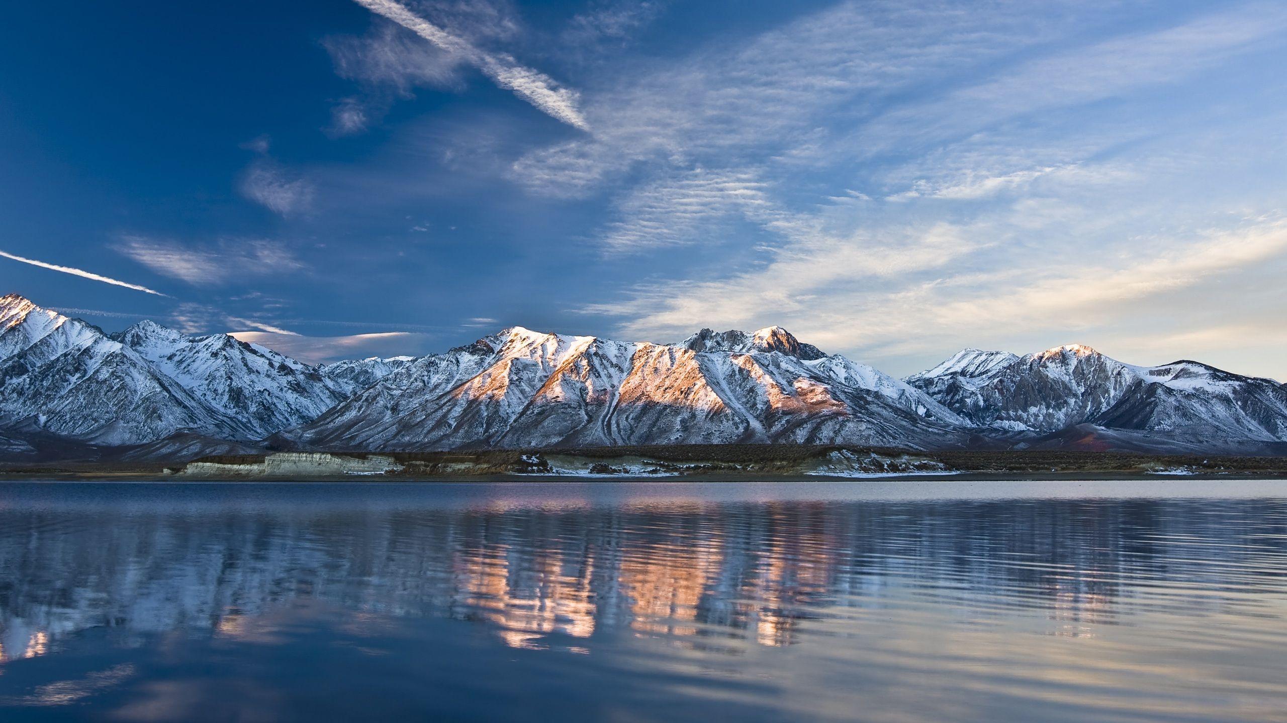 2560x1440 Lake And Snow Capped Mountains In Winter 750x1334 IPhone 8 7 6 6S