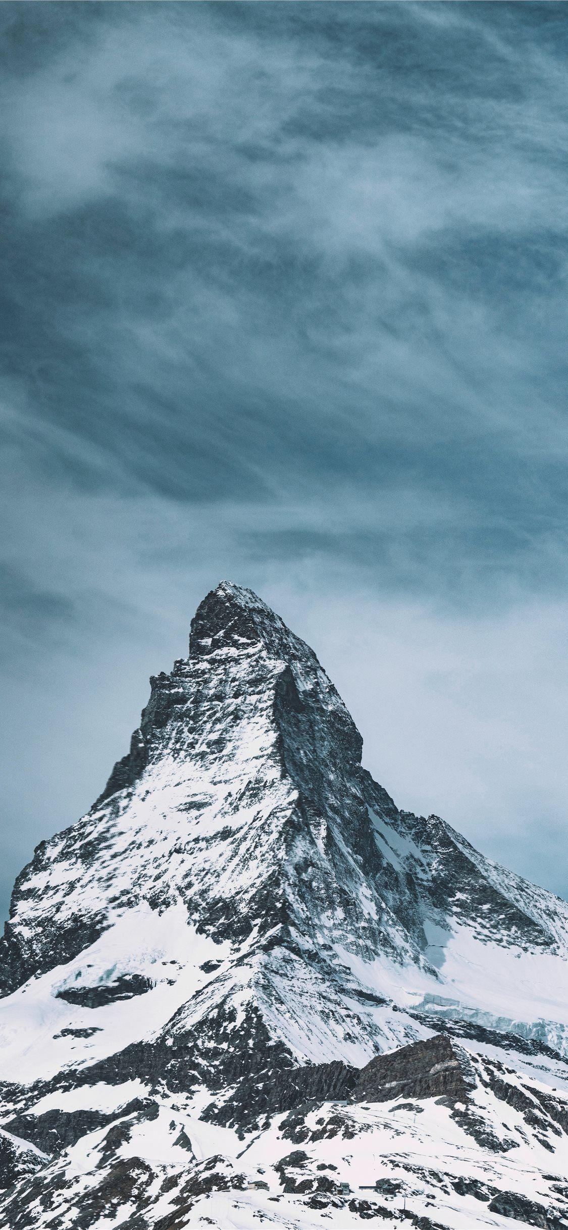 1125x2436 snow capped mountain during daytime iPhone X Wallpaper Free Download