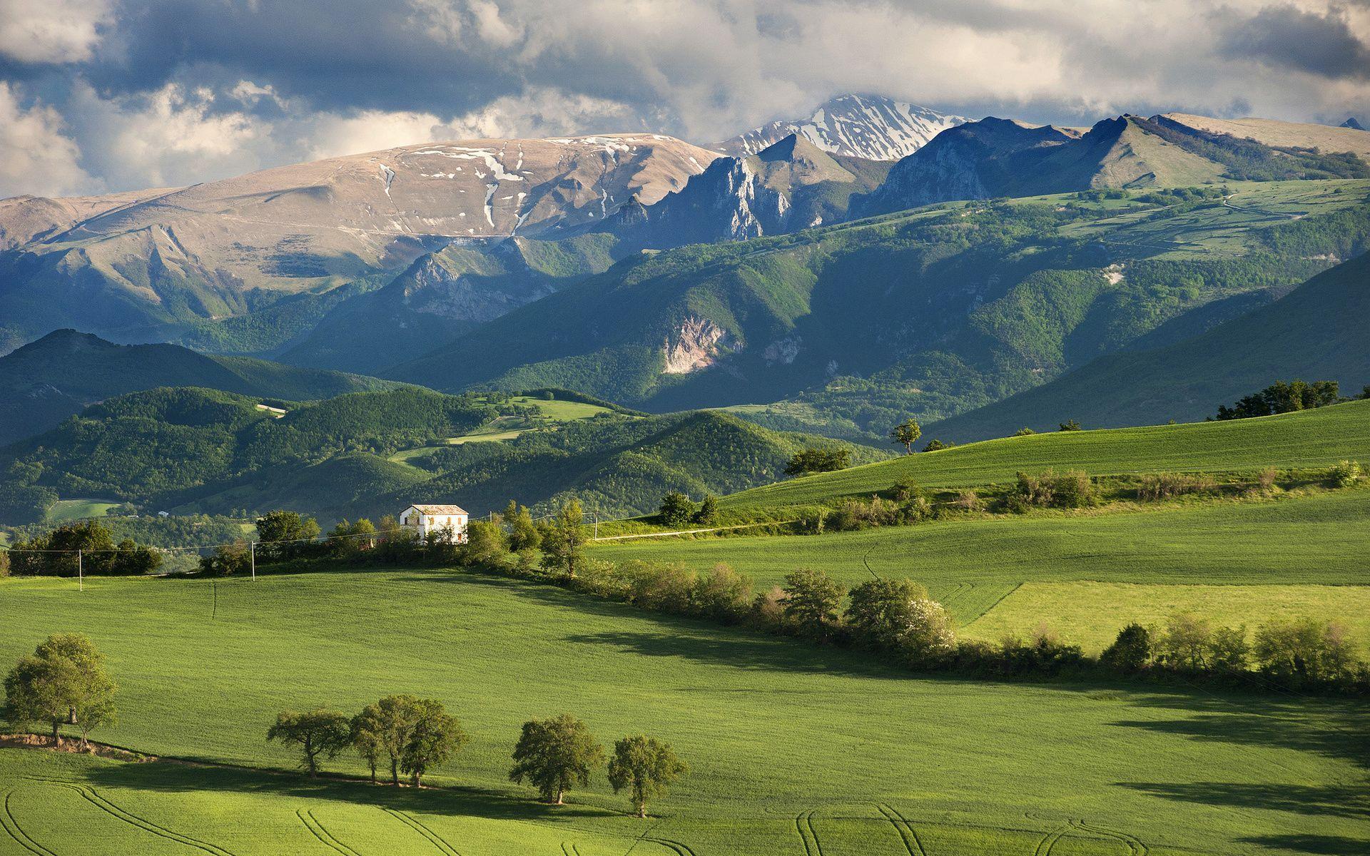 1920x1200 Green Hills Progressing To Snow Capped Mountains. Landscape