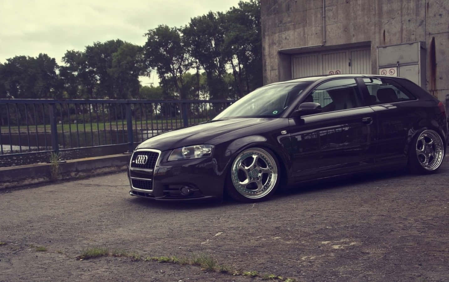 1433x900 Download Sleek and Stylish Audi A3 on a Scenic Drive Wallpaper