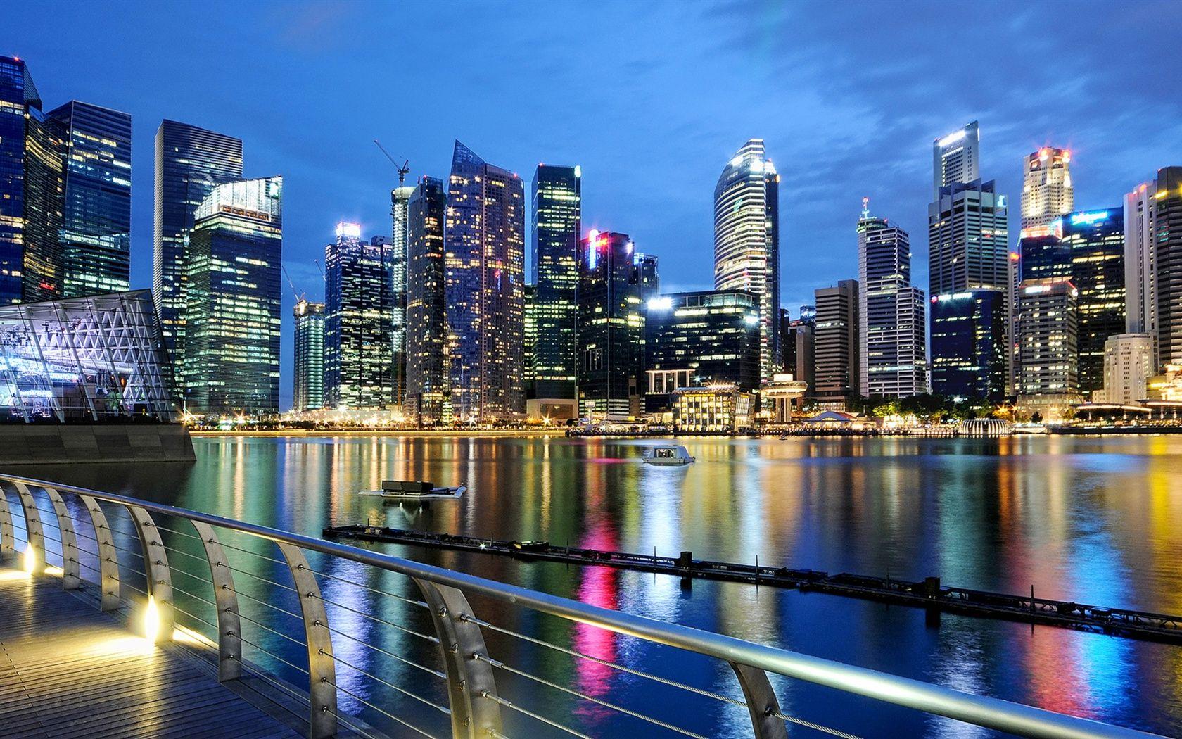 1680x1050 Wallpaper Singapore, city, evening, dusk, lights, buildings, water