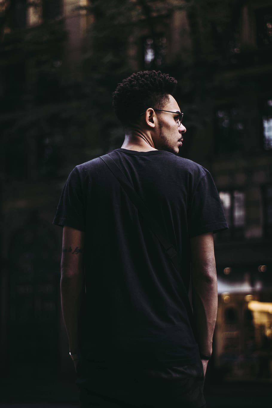 910x1365 HD wallpaper: Photo of Man Wearing Black Shirt, adult, back view, blur, depth of field