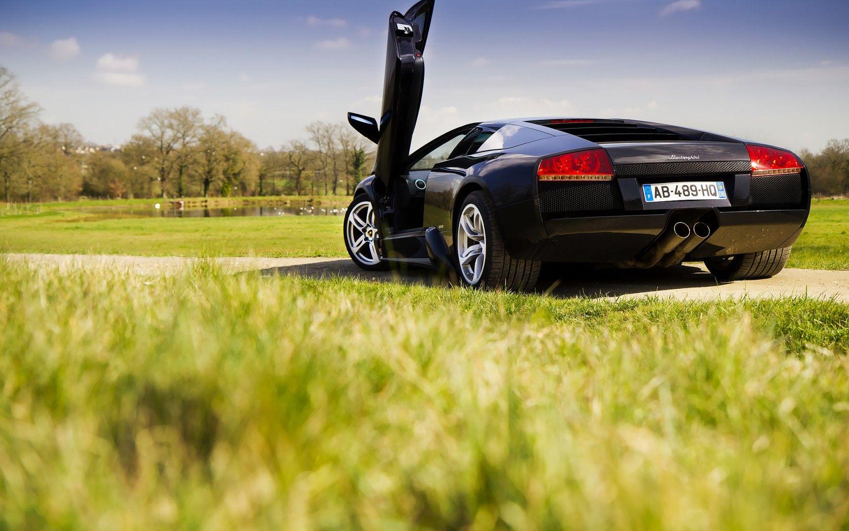 1680x1050 Black Lamborghini Murcielago Open Door Desktop Wallpaper