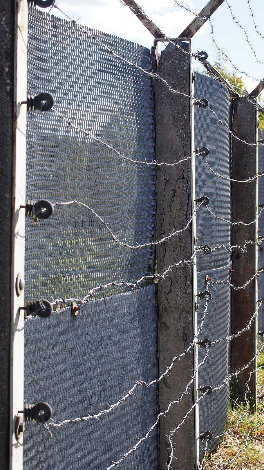 910x1618 HD wallpaper: cross fence, ddr, barbed wire, border, gdr border
