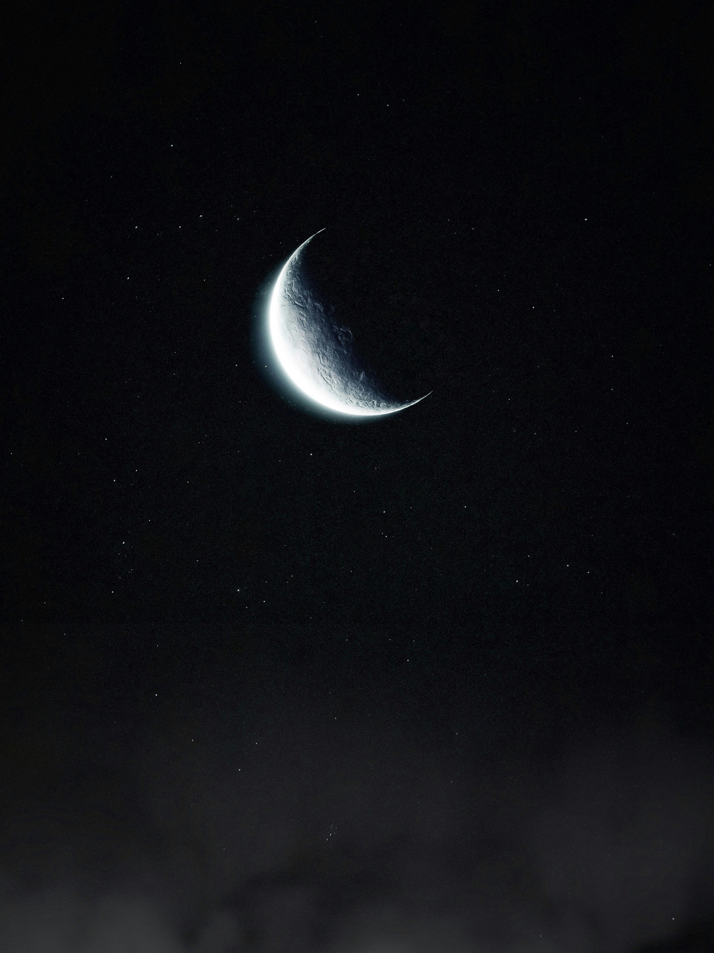 3000x4000 A crescent moon in the night sky photo