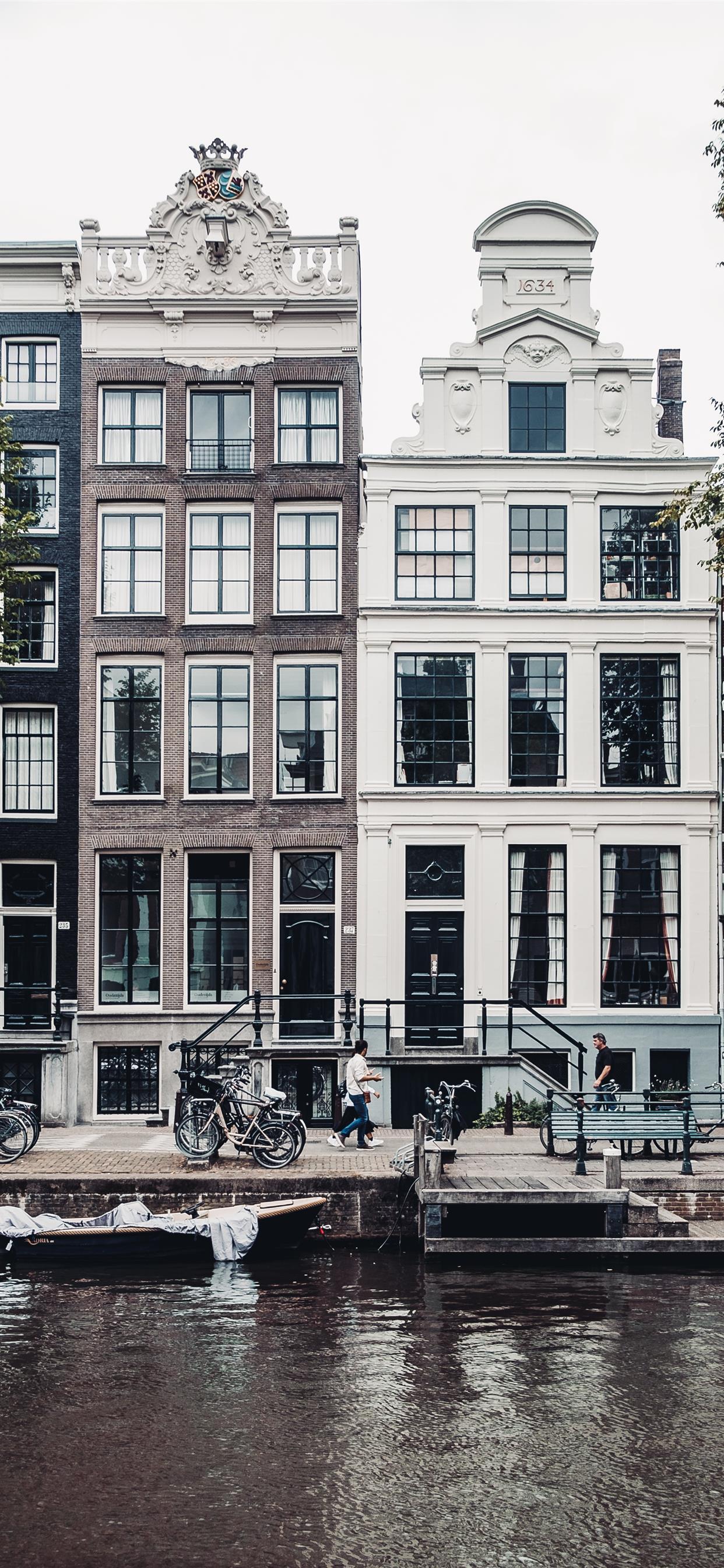 1242x2688 Pedestrians in Amsterdam iPhone Wallpaper Free Download
