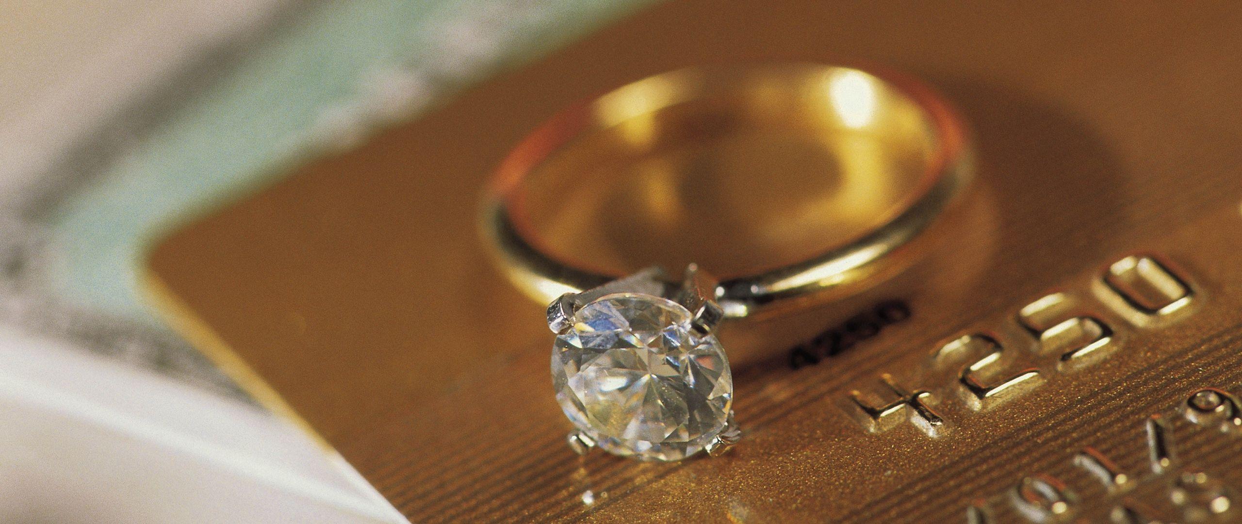 2560x1080 Download wallpaper 2560x1080 ring, gold, diamond, visa dual wide
