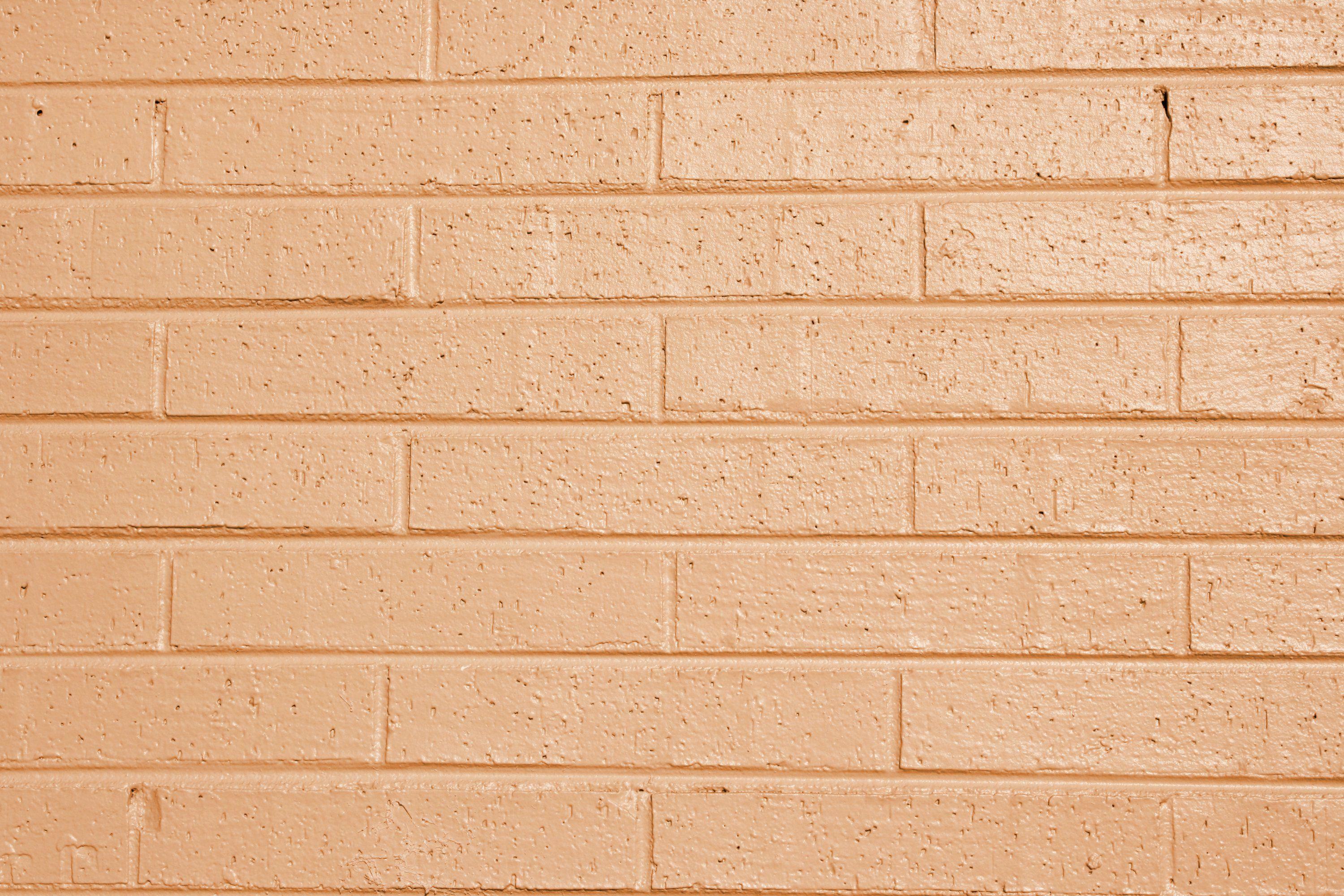 Hình ảnh kết cấu tường gạch sơn màu cam nhạt hoặc màu đào 3000x2000.  Miễn phí