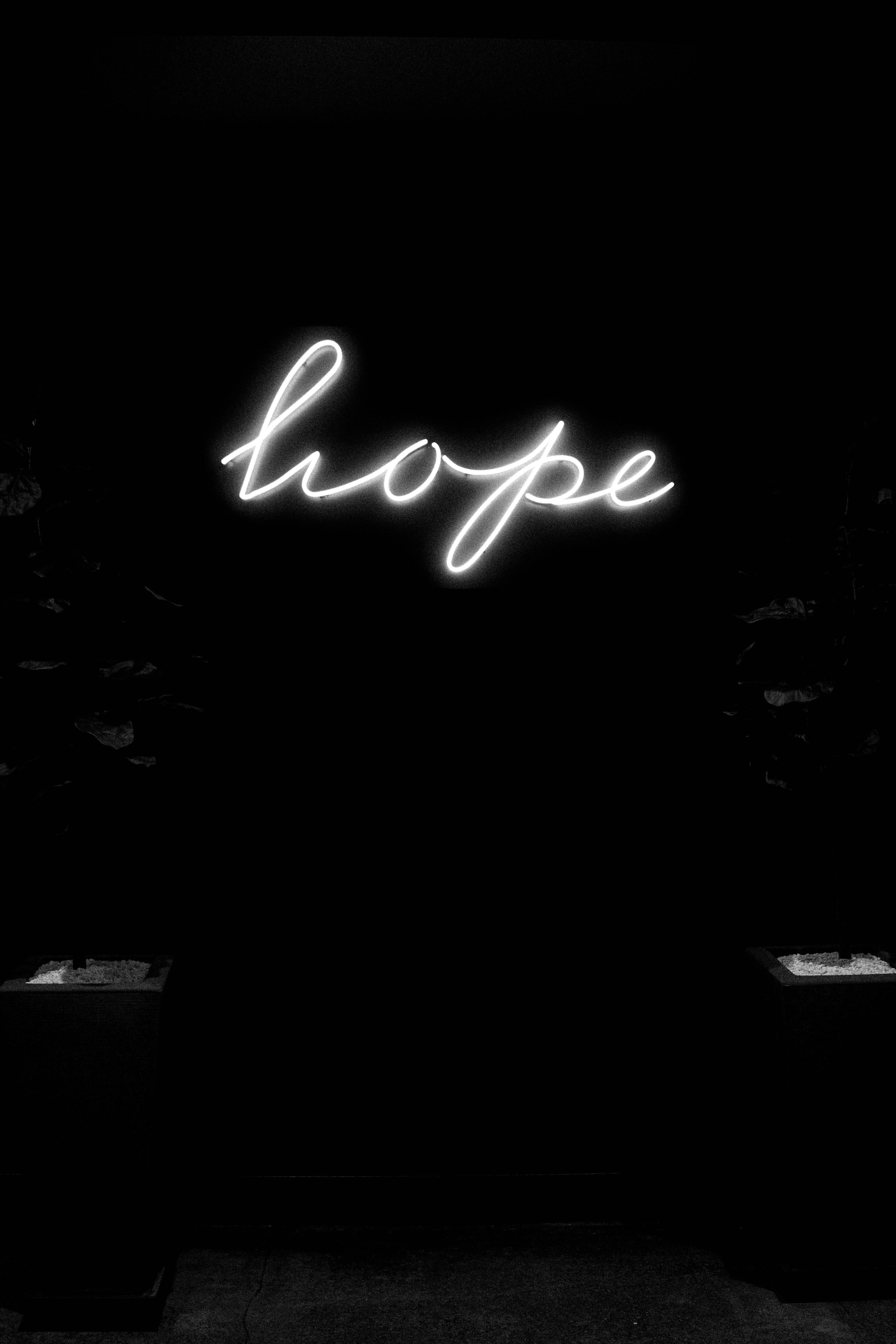 4000x6000 Neon Hope Sign Illuminating Dark Space · Free