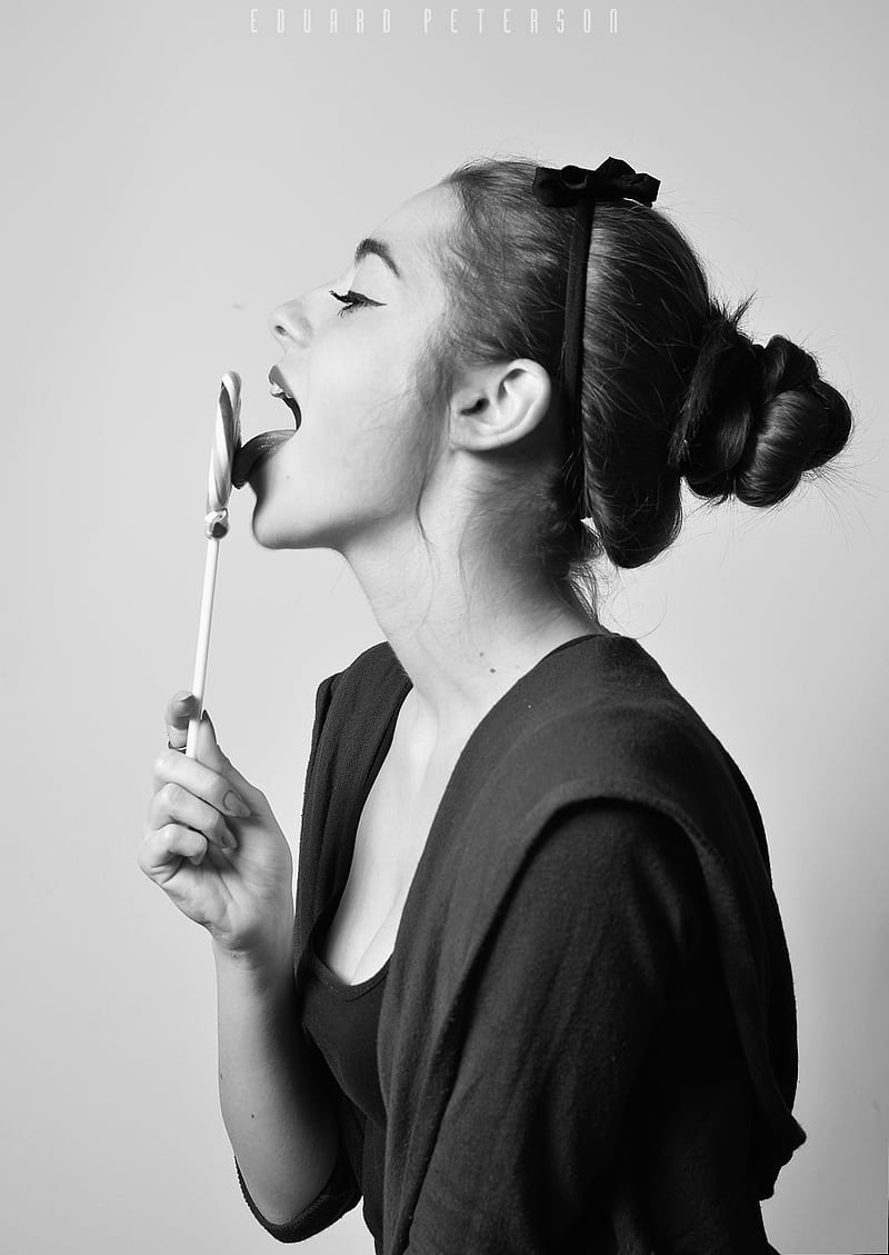 800x1129 Tongue out, food, monochrome, lollipop, women, sweets, licking, brunette, HD phone wallpaper