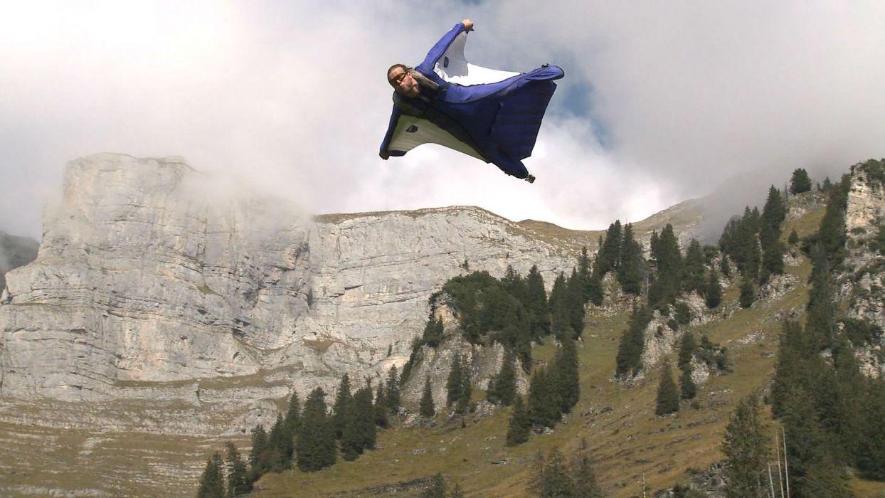 1244x700 Wingsuit parachute flying fly flight extreme birdman diving skydive