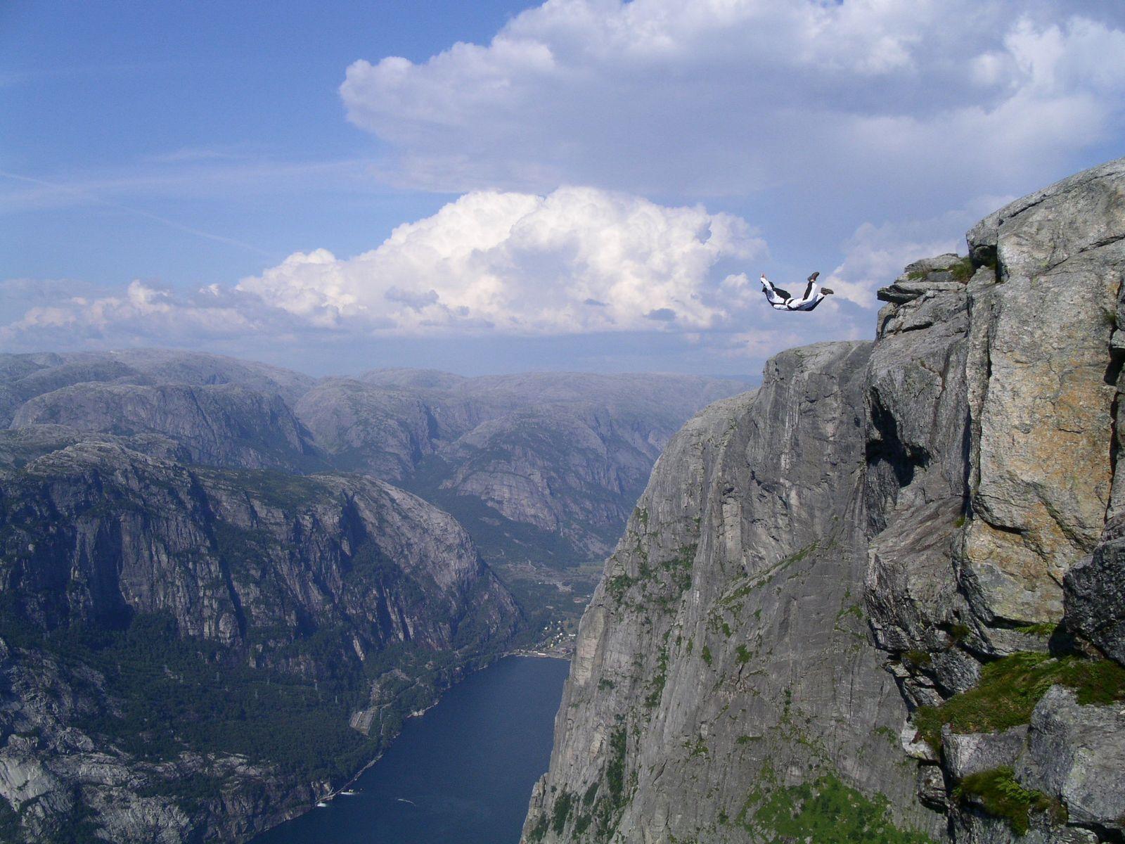 1600x1200 Wallpaper rocks, jump, base jumping, norway, mountains, parachute