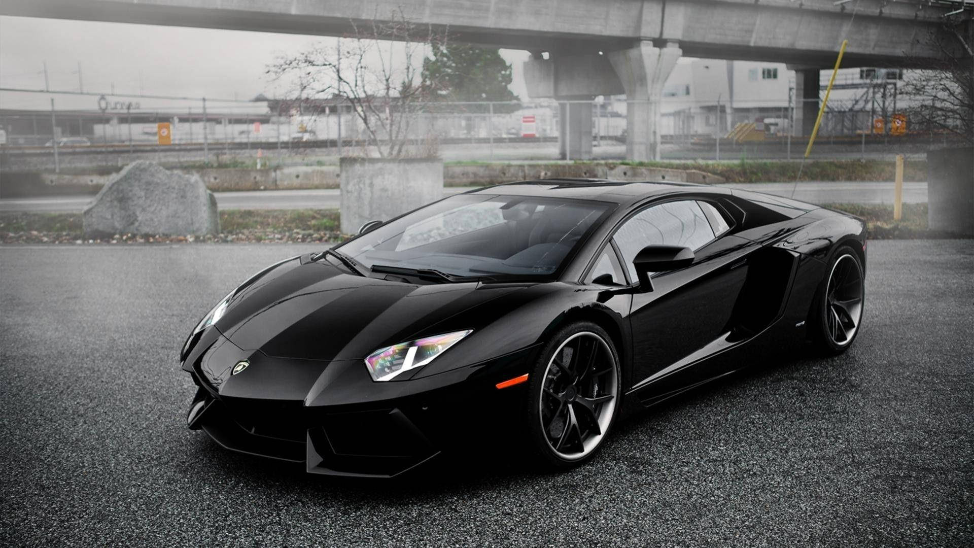 1920x1080 Download Stunning Black Lamborghini Glowing Against the Night Sky Wallpaper
