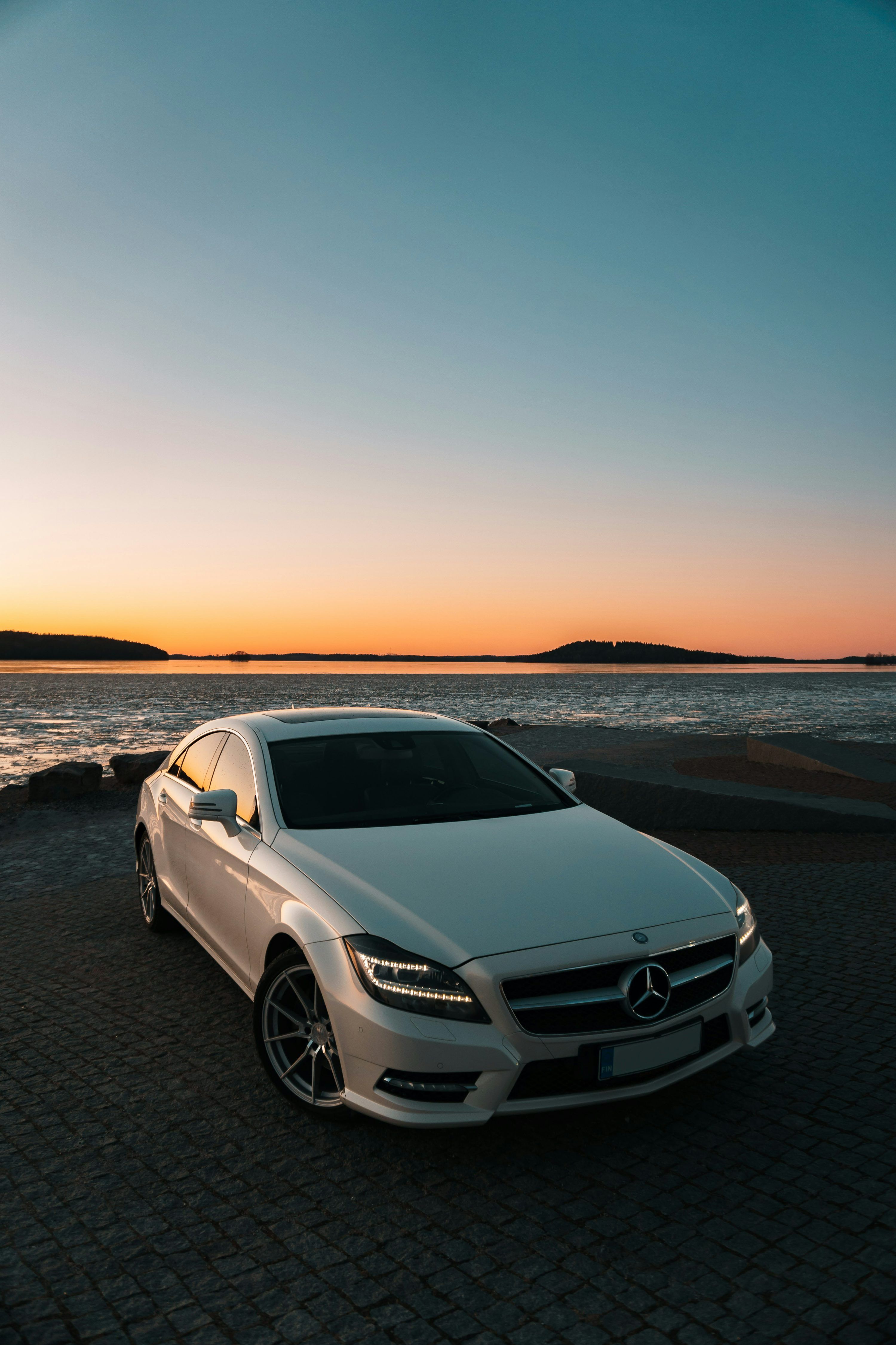 3000x4500 White mercedes benz c class on beach during sunset photo