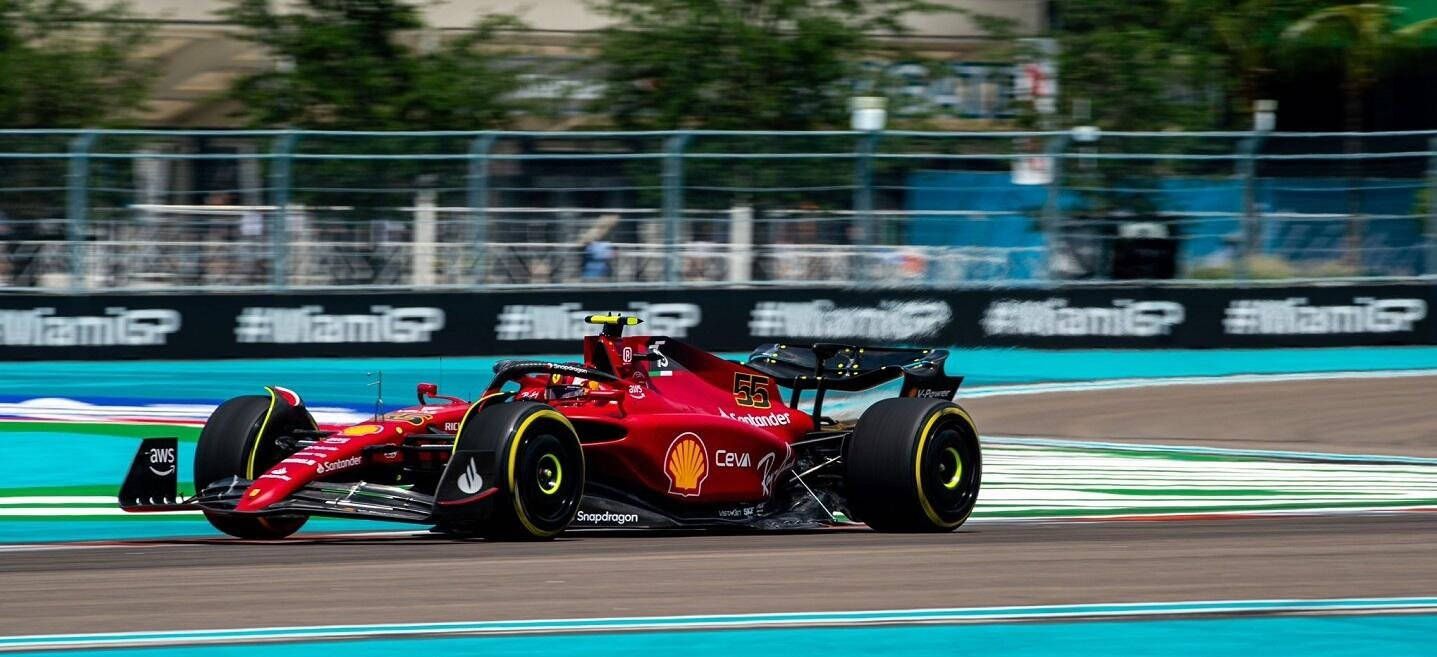 1437x657 Download Carlos Sainz Jr. Racing in Miami Grand Prix Wallpaper