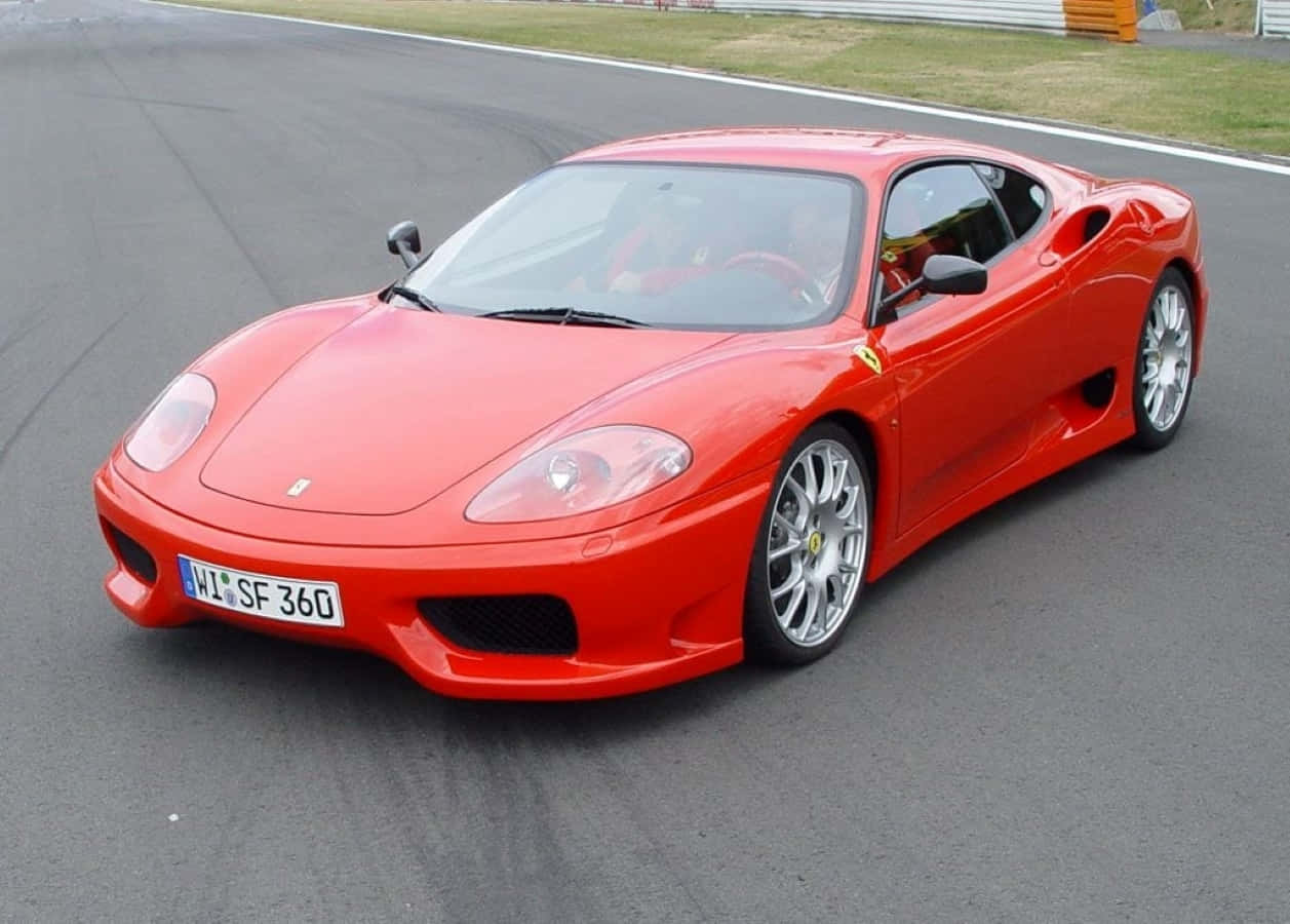 1257x900 Download Stunning Red Ferrari 360 Modena parked outdoors Wallpaper
