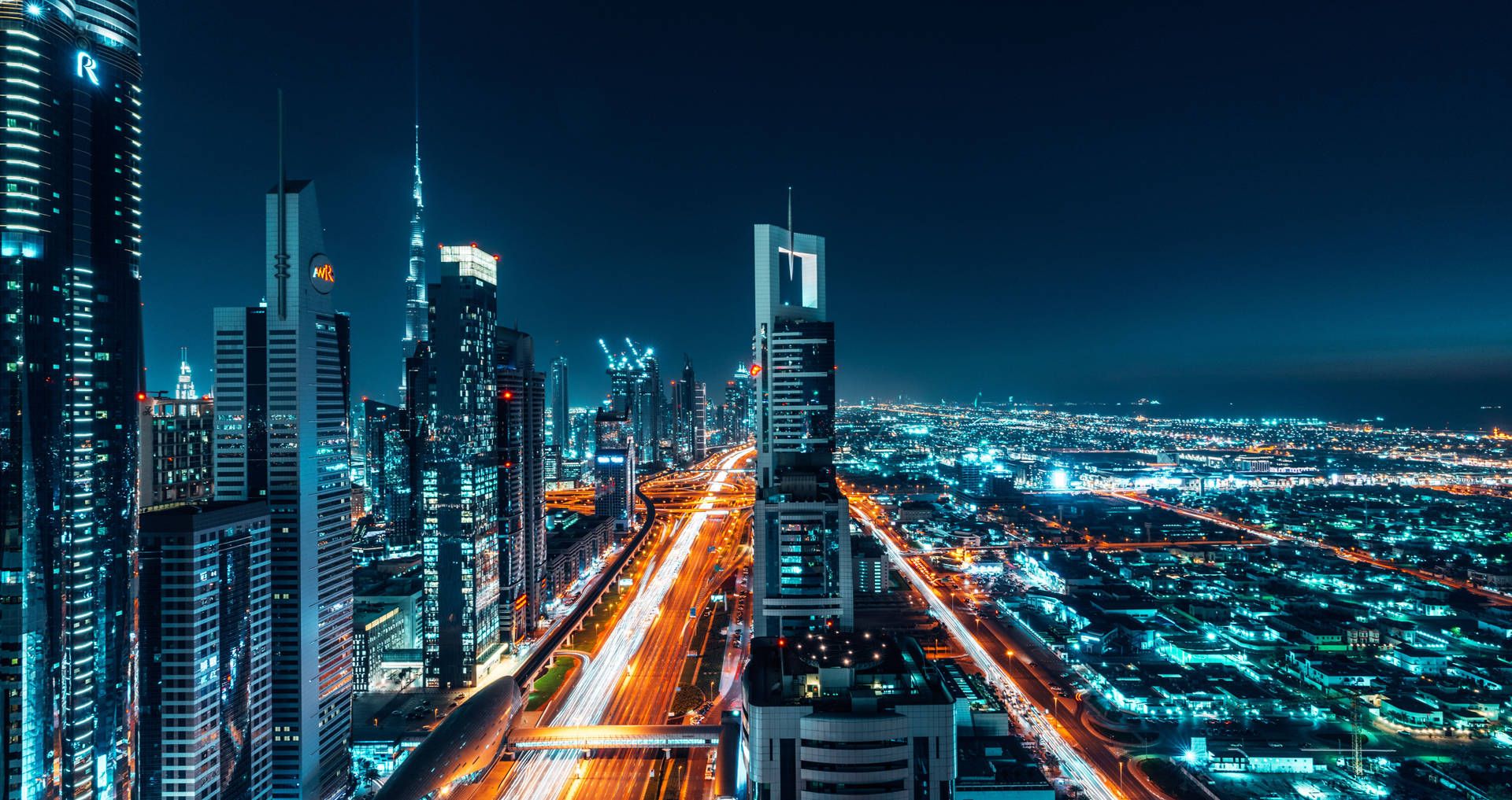 1920x1017 Download Vibrant Nightlife In Dubai 4K Wallpaper