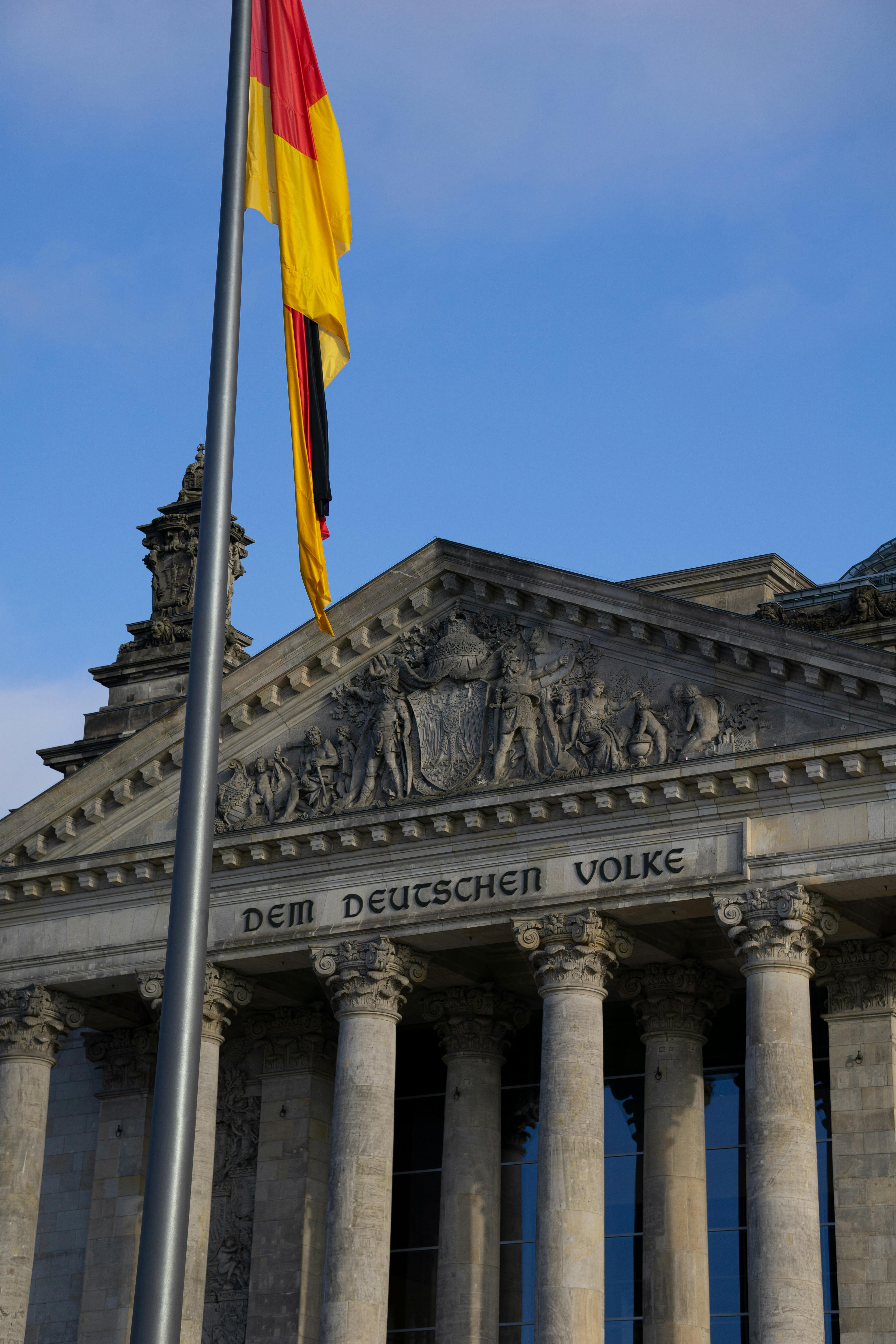 4000x6000 Germany Flag in Front of Building · Free