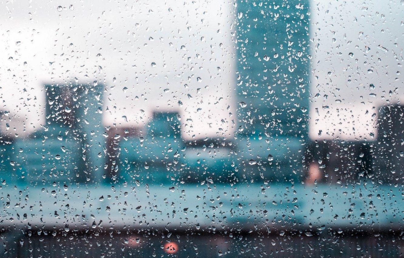1332x850 Wallpaper glass, water, drops, city, the city, rain, window, glass