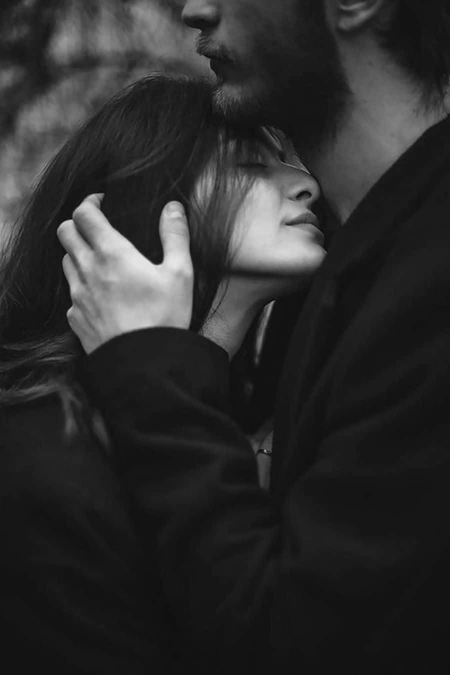 900x1349 Download A Young Black Couple in Love Wallpaper