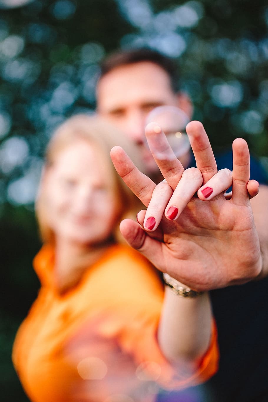 910x1364 HD wallpaper: Young couple holding hands outdoors, people, love, romantic, together