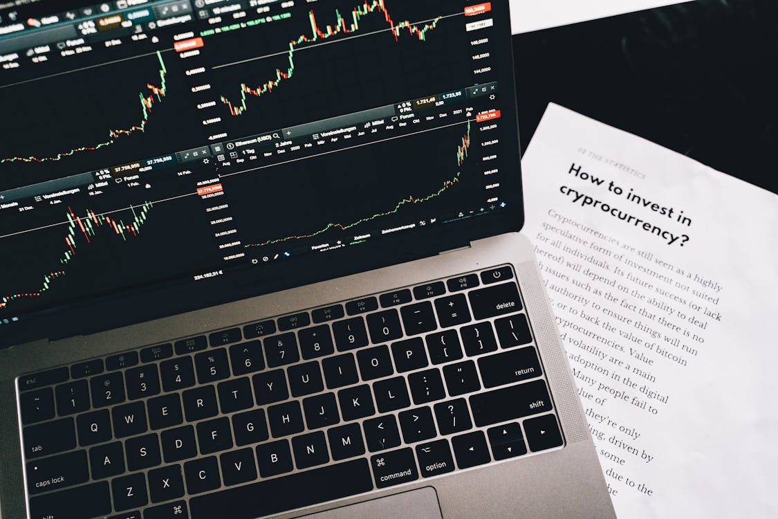 1125x750 Research Paper Beside Laptop · Free