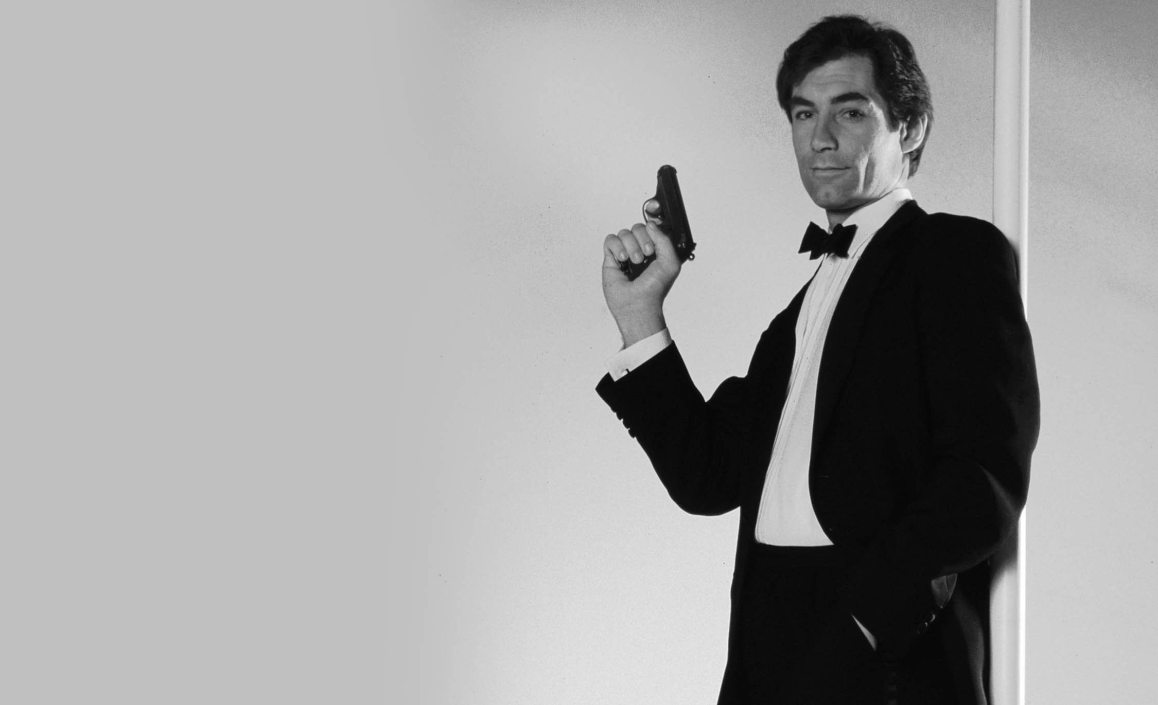 2250x1371 James Bond (Timothy Dalton) Wallpaper