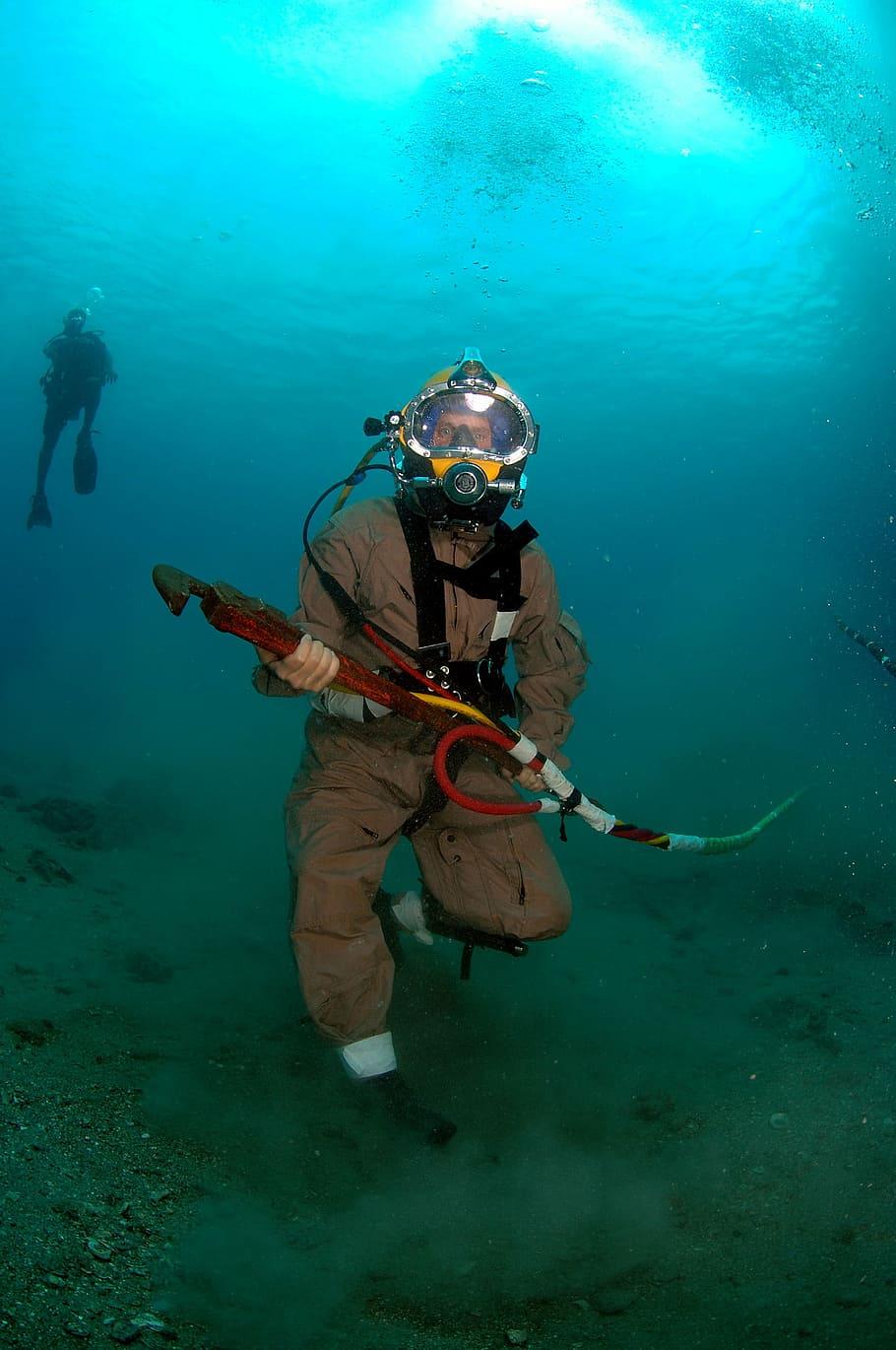 910x1370 HD wallpaper: diver, salvage, navy, military, ocean floor, walking, wrench