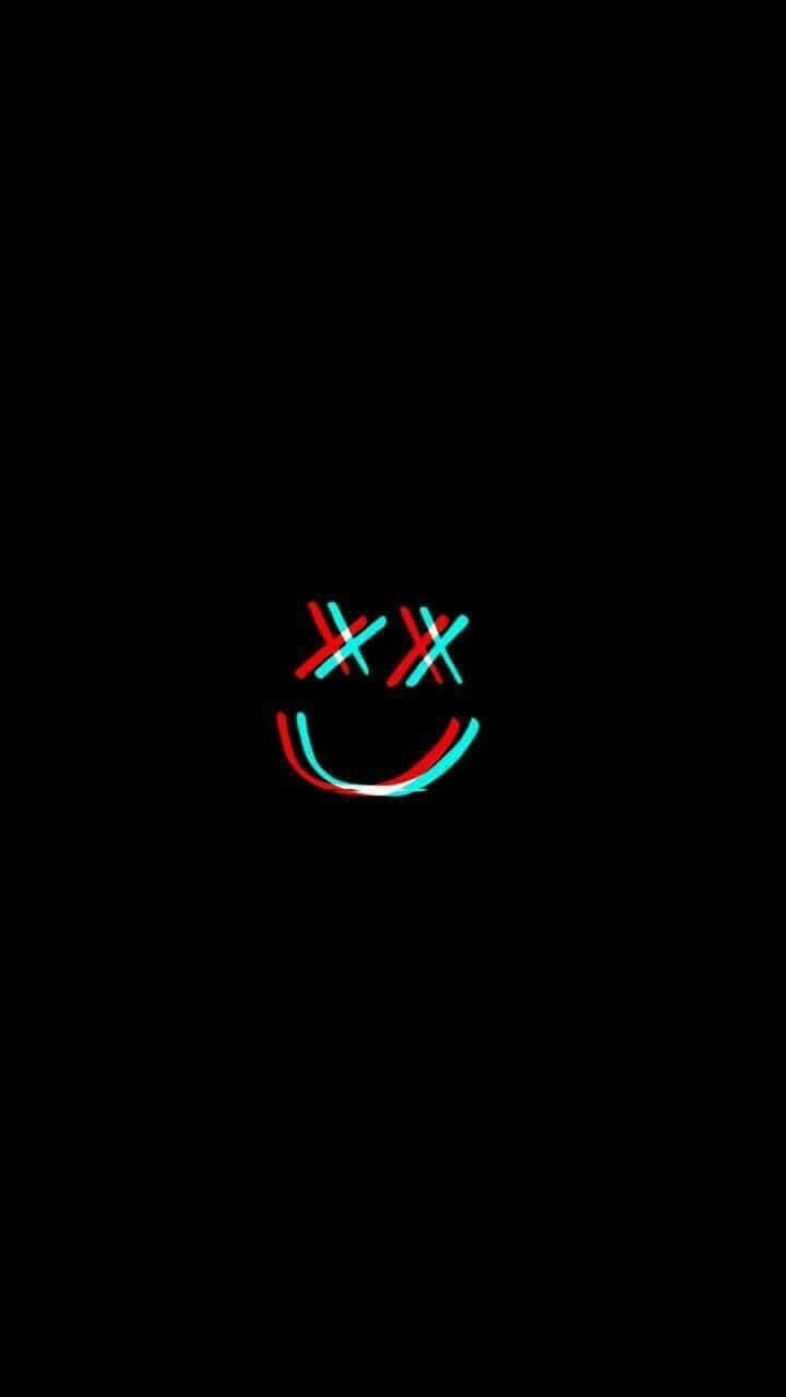 720x1280 Download A Black Background With A Smiling Face On It Wallpaper